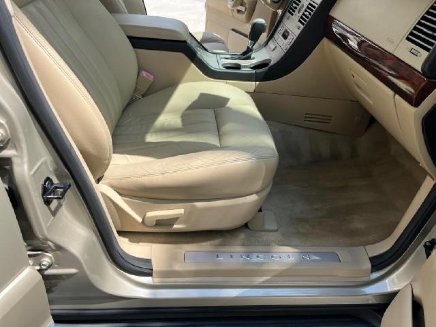 2005 Light French Silk Metallic /Camel Lincoln Aviator 3RD ROW AWD LOW MILES 65,811 (5LMEU88H35Z) with an 4.6L DOHC 32-Valve V8 Engine engine, Automatic transmission, located at 4701 North Dixie Hwy, Pompano Beach, FL, 33064, (954) 422-2889, 26.240938, -80.123474 - 2005 LINCOLN AVIATOR LUXURY ROAD READY AWD 4.6L V8 VIN: 5LMEU88H35ZJ28893 NO RECALLS LOW MILES 65,811 4 DOOR WAGON/SPORT UTILITY FLORIDA OWNER DUAL AC 4.6L V8 F DOHC PARK SENSORS SUNROOF GASOLINE 3 ROW LEATHER SEATS ALL WHEEL DRIVE DUAL ZONE AC 7 SERVICE RECORDS AWD Active Head Restraints Active Par - Photo#25