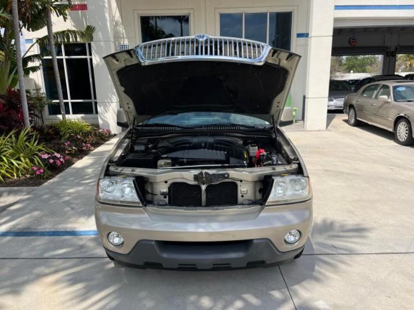 2005 Light French Silk Metallic /Camel Lincoln Aviator 3RD ROW AWD LOW MILES 65,811 (5LMEU88H35Z) with an 4.6L DOHC 32-Valve V8 Engine engine, Automatic transmission, located at 4701 North Dixie Hwy, Pompano Beach, FL, 33064, (954) 422-2889, 26.240938, -80.123474 - 2005 LINCOLN AVIATOR LUXURY ROAD READY AWD 4.6L V8 VIN: 5LMEU88H35ZJ28893 NO RECALLS LOW MILES 65,811 4 DOOR WAGON/SPORT UTILITY FLORIDA OWNER DUAL AC 4.6L V8 F DOHC PARK SENSORS SUNROOF GASOLINE 3 ROW LEATHER SEATS ALL WHEEL DRIVE DUAL ZONE AC 7 SERVICE RECORDS AWD Active Head Restraints Active Par - Photo#75