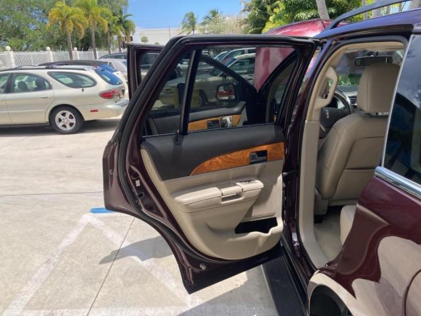 2011 Bordeaux Reserve Red Metallic /Light Stone Lincoln MKX SUV LOW MILES 77,000 (2LMDJ6JK1BB) with an 3.7L Ti-VCT V6 Engine engine, Automatic transmission, located at 4701 North Dixie Hwy, Pompano Beach, FL, 33064, (954) 422-2889, 26.240938, -80.123474 - 2011 LINCOLN MKX NEW $39,145 LOW MILES 74,654 VIN: 2LMDJ6JK1BBJ08582 NO ACCIDENTS NO RECALLS 4 DOOR WAGON/SPORT UTILITY FLORIDA OWNER RUST FREE 3.7L V6 F DOHC 24V DUAL ZONE AC DUAL EXHAUST GASOLINE MEMORY SEATS POWER SEATS FRONT WHEEL DRIVE BLUETOOTH POWER BACK DOOR Adjustable Lumbar Support Alloy W - Photo#11