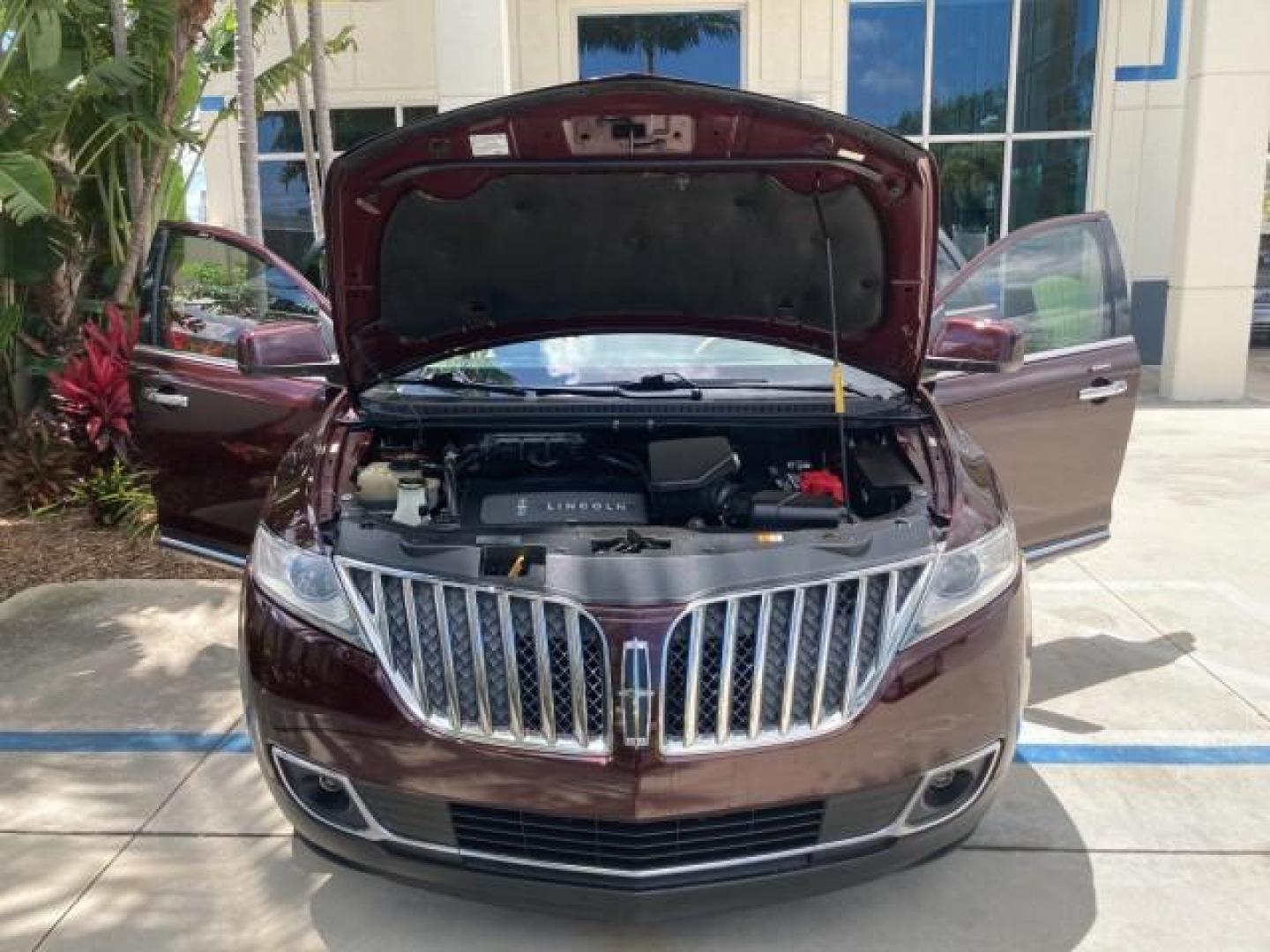 2011 Bordeaux Reserve Red Metallic /Light Stone Lincoln MKX SUV LOW MILES 77,000 (2LMDJ6JK1BB) with an 3.7L Ti-VCT V6 Engine engine, Automatic transmission, located at 4701 North Dixie Hwy, Pompano Beach, FL, 33064, (954) 422-2889, 26.240938, -80.123474 - 2011 LINCOLN MKX NEW $39,145 LOW MILES 74,654 VIN: 2LMDJ6JK1BBJ08582 NO ACCIDENTS NO RECALLS 4 DOOR WAGON/SPORT UTILITY FLORIDA OWNER RUST FREE 3.7L V6 F DOHC 24V DUAL ZONE AC DUAL EXHAUST GASOLINE MEMORY SEATS POWER SEATS FRONT WHEEL DRIVE BLUETOOTH POWER BACK DOOR Adjustable Lumbar Support Alloy W - Photo#12