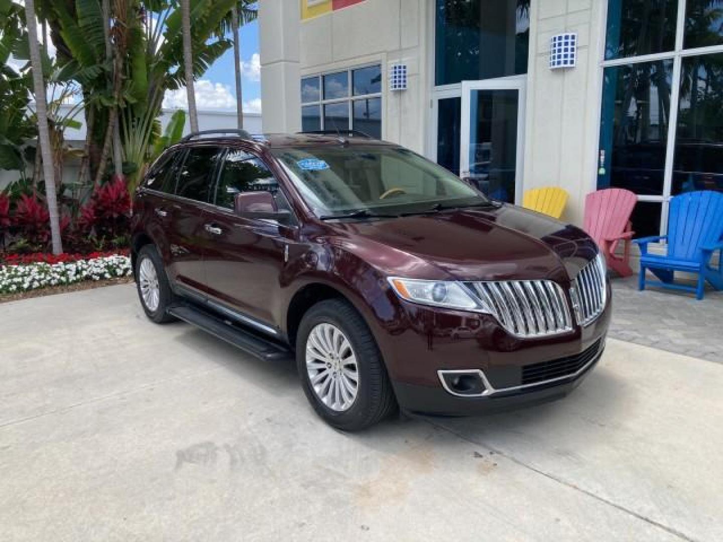 2011 Bordeaux Reserve Red Metallic /Light Stone Lincoln MKX SUV LOW MILES 77,000 (2LMDJ6JK1BB) with an 3.7L Ti-VCT V6 Engine engine, Automatic transmission, located at 4701 North Dixie Hwy, Pompano Beach, FL, 33064, (954) 422-2889, 26.240938, -80.123474 - 2011 LINCOLN MKX NEW $39,145 LOW MILES 74,654 VIN: 2LMDJ6JK1BBJ08582 NO ACCIDENTS NO RECALLS 4 DOOR WAGON/SPORT UTILITY FLORIDA OWNER RUST FREE 3.7L V6 F DOHC 24V DUAL ZONE AC DUAL EXHAUST GASOLINE MEMORY SEATS POWER SEATS FRONT WHEEL DRIVE BLUETOOTH POWER BACK DOOR Adjustable Lumbar Support Alloy W - Photo#1