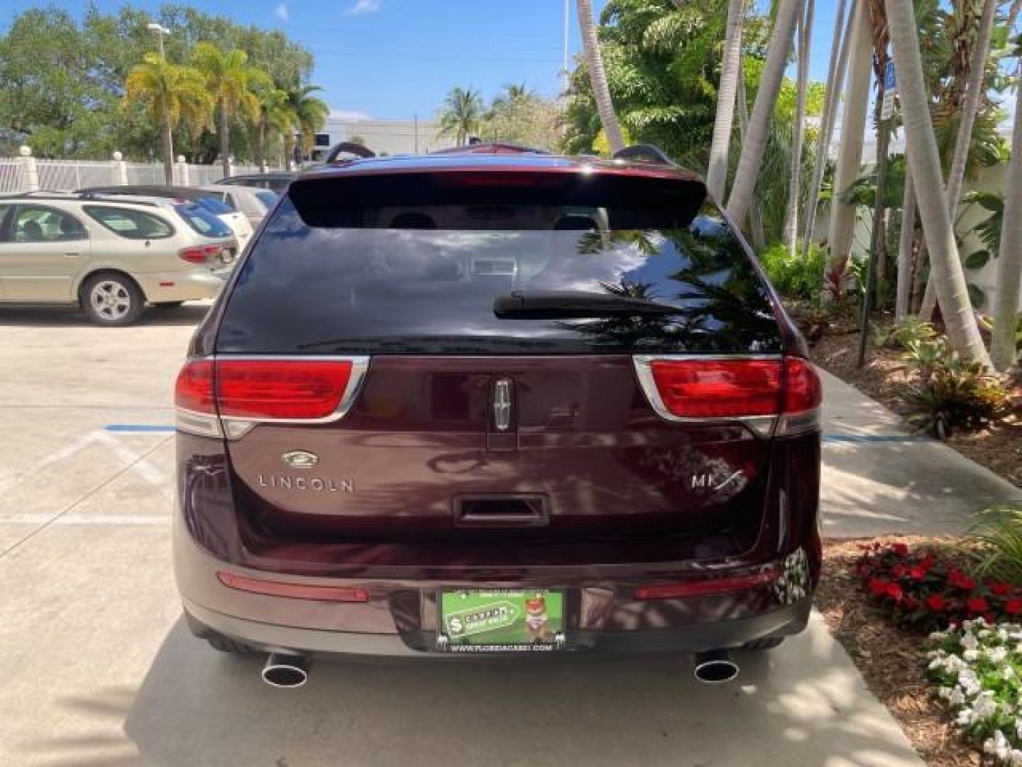 2011 Bordeaux Reserve Red Metallic /Light Stone Lincoln MKX SUV LOW MILES 77,000 (2LMDJ6JK1BB) with an 3.7L Ti-VCT V6 Engine engine, Automatic transmission, located at 4701 North Dixie Hwy, Pompano Beach, FL, 33064, (954) 422-2889, 26.240938, -80.123474 - 2011 LINCOLN MKX NEW $39,145 LOW MILES 74,654 VIN: 2LMDJ6JK1BBJ08582 NO ACCIDENTS NO RECALLS 4 DOOR WAGON/SPORT UTILITY FLORIDA OWNER RUST FREE 3.7L V6 F DOHC 24V DUAL ZONE AC DUAL EXHAUST GASOLINE MEMORY SEATS POWER SEATS FRONT WHEEL DRIVE BLUETOOTH POWER BACK DOOR Adjustable Lumbar Support Alloy W - Photo#66