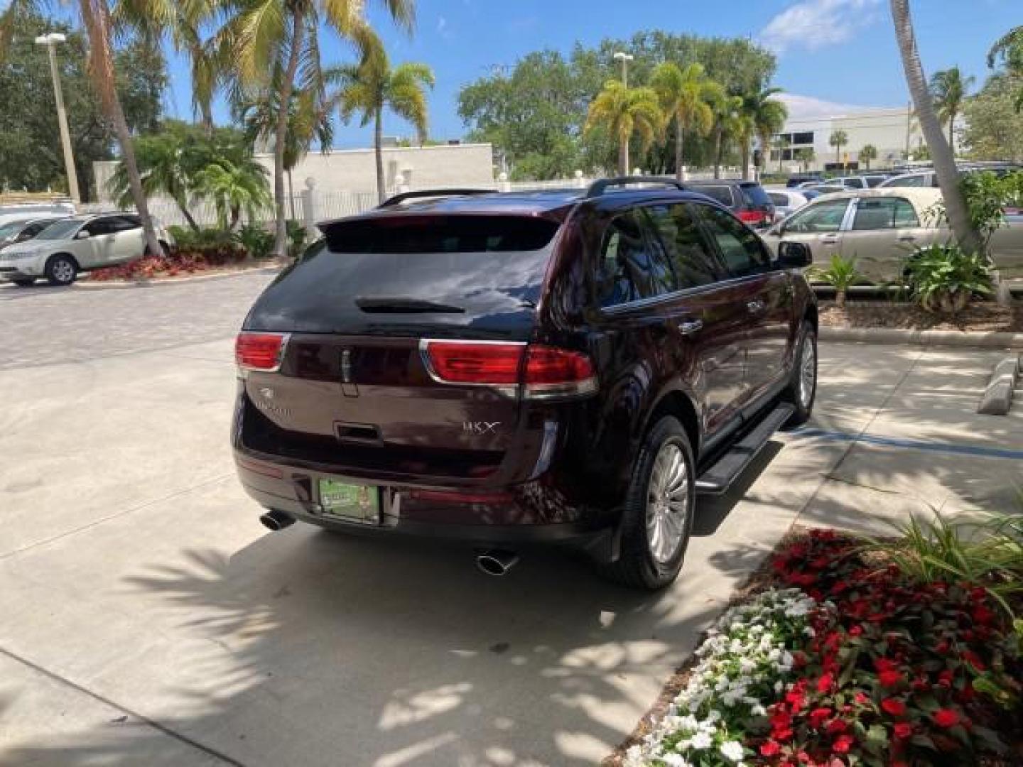 2011 Bordeaux Reserve Red Metallic /Light Stone Lincoln MKX SUV LOW MILES 77,000 (2LMDJ6JK1BB) with an 3.7L Ti-VCT V6 Engine engine, Automatic transmission, located at 4701 North Dixie Hwy, Pompano Beach, FL, 33064, (954) 422-2889, 26.240938, -80.123474 - 2011 LINCOLN MKX NEW $39,145 LOW MILES 74,654 VIN: 2LMDJ6JK1BBJ08582 NO ACCIDENTS NO RECALLS 4 DOOR WAGON/SPORT UTILITY FLORIDA OWNER RUST FREE 3.7L V6 F DOHC 24V DUAL ZONE AC DUAL EXHAUST GASOLINE MEMORY SEATS POWER SEATS FRONT WHEEL DRIVE BLUETOOTH POWER BACK DOOR Adjustable Lumbar Support Alloy W - Photo#7