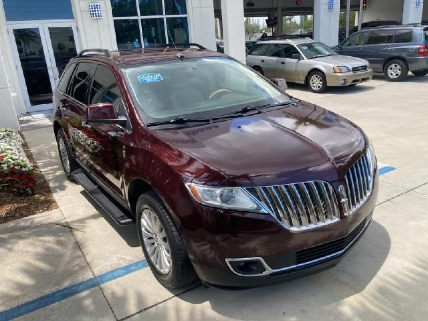 2011 Bordeaux Reserve Red Metallic /Light Stone Lincoln MKX SUV LOW MILES 77,000 (2LMDJ6JK1BB) with an 3.7L Ti-VCT V6 Engine engine, Automatic transmission, located at 4701 North Dixie Hwy, Pompano Beach, FL, 33064, (954) 422-2889, 26.240938, -80.123474 - 2011 LINCOLN MKX NEW $39,145 LOW MILES 74,654 VIN: 2LMDJ6JK1BBJ08582 NO ACCIDENTS NO RECALLS 4 DOOR WAGON/SPORT UTILITY FLORIDA OWNER RUST FREE 3.7L V6 F DOHC 24V DUAL ZONE AC DUAL EXHAUST GASOLINE MEMORY SEATS POWER SEATS FRONT WHEEL DRIVE BLUETOOTH POWER BACK DOOR Adjustable Lumbar Support Alloy W - Photo#80