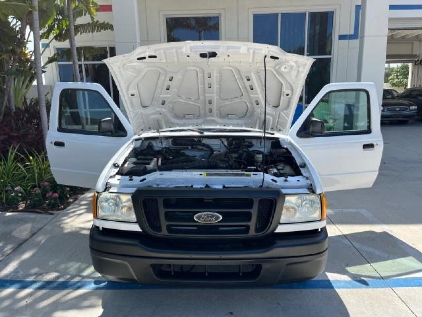 2004 Oxford White /Medium Dk Flint Ford Ranger XL PU LOW MILES 98,854 (1FTYR10U14P) with an 3.0L SEFI V6 Engine engine, Automatic transmission, located at 4701 North Dixie Hwy, Pompano Beach, FL, 33064, (954) 422-2889, 26.240938, -80.123474 - OUR WEBPAGE FLORIDACARS1.COM HAS OVER 100 PHOTOS AND FREE CARFAX LINK 2004 FORD RANGER XL ROAD READY 7 FT BED FLORIDA OWNER VIN: 1FTYR10U14PA86613 PICKUP NO ACCIDENTS NO RECALLS 3.0L V6 F OHV GASOLINE LOW MILES 98,854 3.0L V6 REAR WHEEL DRIVE THIS IS THE LOWEST MILE WITH ONLY 98,854 IN THE COUNTRY F - Photo#14