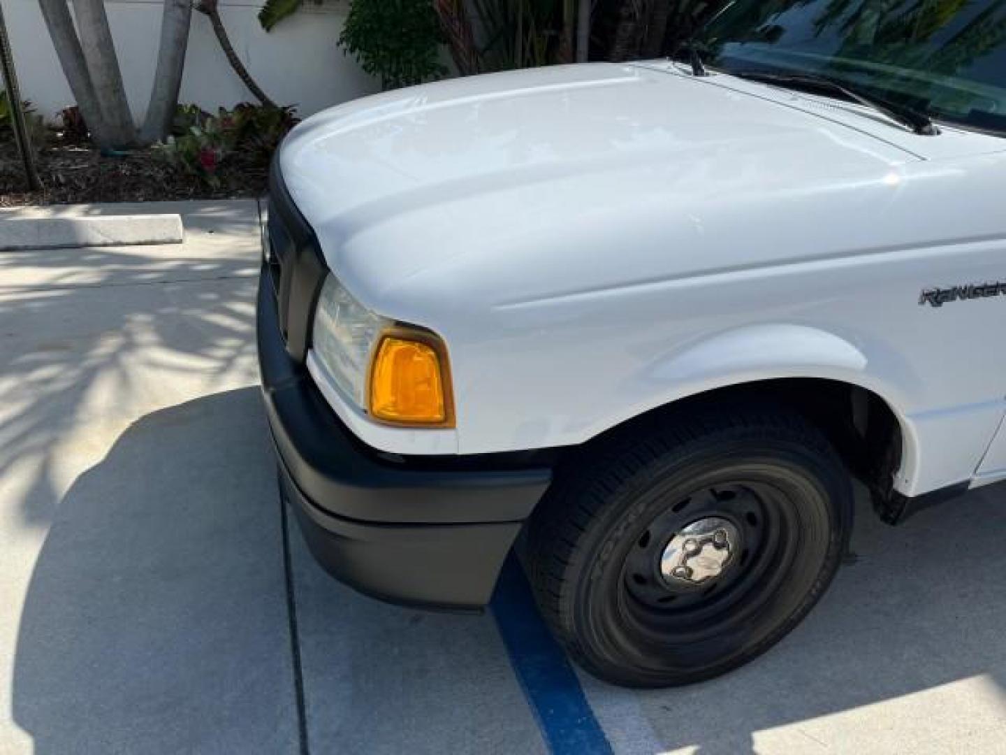 2004 Oxford White /Medium Dk Flint Ford Ranger XL PU LOW MILES 98,854 (1FTYR10U14P) with an 3.0L SEFI V6 Engine engine, Automatic transmission, located at 4701 North Dixie Hwy, Pompano Beach, FL, 33064, (954) 422-2889, 26.240938, -80.123474 - OUR WEBPAGE FLORIDACARS1.COM HAS OVER 100 PHOTOS AND FREE CARFAX LINK 2004 FORD RANGER XL ROAD READY 7 FT BED FLORIDA OWNER VIN: 1FTYR10U14PA86613 PICKUP NO ACCIDENTS NO RECALLS 3.0L V6 F OHV GASOLINE LOW MILES 98,854 3.0L V6 REAR WHEEL DRIVE THIS IS THE LOWEST MILE WITH ONLY 98,854 IN THE COUNTRY F - Photo#59