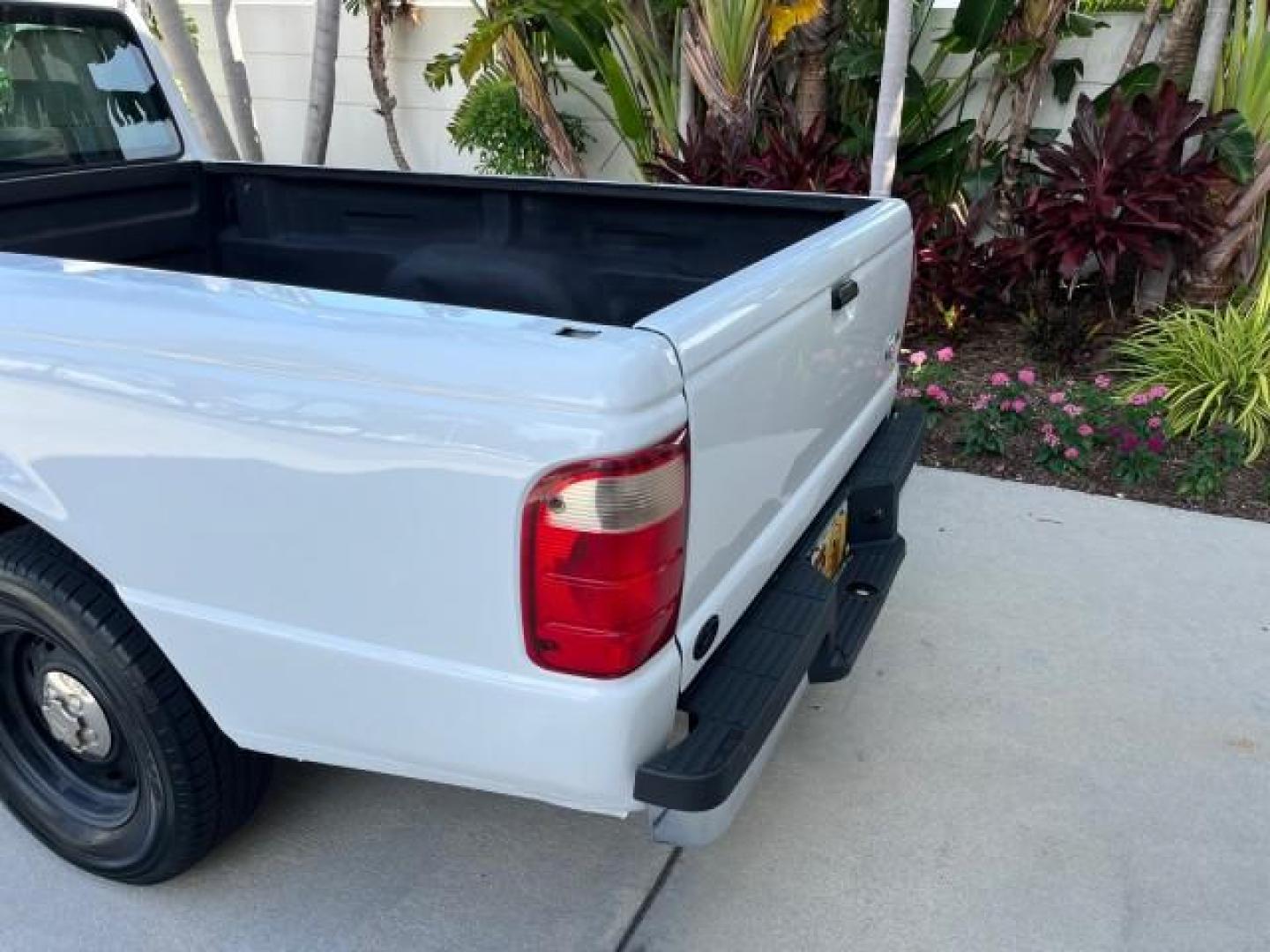 2004 Oxford White /Medium Dk Flint Ford Ranger XL PU LOW MILES 98,854 (1FTYR10U14P) with an 3.0L SEFI V6 Engine engine, Automatic transmission, located at 4701 North Dixie Hwy, Pompano Beach, FL, 33064, (954) 422-2889, 26.240938, -80.123474 - OUR WEBPAGE FLORIDACARS1.COM HAS OVER 100 PHOTOS AND FREE CARFAX LINK 2004 FORD RANGER XL ROAD READY 7 FT BED FLORIDA OWNER VIN: 1FTYR10U14PA86613 PICKUP NO ACCIDENTS NO RECALLS 3.0L V6 F OHV GASOLINE LOW MILES 98,854 3.0L V6 REAR WHEEL DRIVE THIS IS THE LOWEST MILE WITH ONLY 98,854 IN THE COUNTRY F - Photo#76