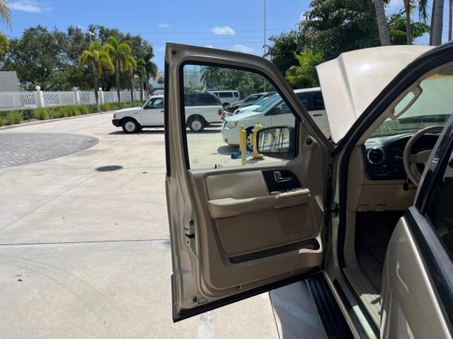 2005 Pueblo Gold Metallic /Medium Flint Grey Ford Expedition 1 FL XLT LOW MILES 46,198 (1FMPU15595L) with an 5.4L SOHC SEFI 24-Valve V8 Engine engine, Automatic transmission, located at 4701 North Dixie Hwy, Pompano Beach, FL, 33064, (954) 422-2889, 26.240938, -80.123474 - OUR WEBPAGE FLORIDACARS1.COM HAS OVER 100 PHOTOS AND FREE CARFAX LINK 2005 FORD EXPEDITION XLT NEW $35,450 ROAD READY VIN: 1FMPU15595LA16261 1 FLORIDA OWNER 4 DOOR WAGON/SPORT UTILITY 3 ROW SEATS POWER 3RD ROW 5.4L V8 F SOHC POWER MIRRORS/SEATS GASOLINE 6 SERVICE RECORDS REAR WHEEL DRIVE LOW MILES 4 - Photo#9