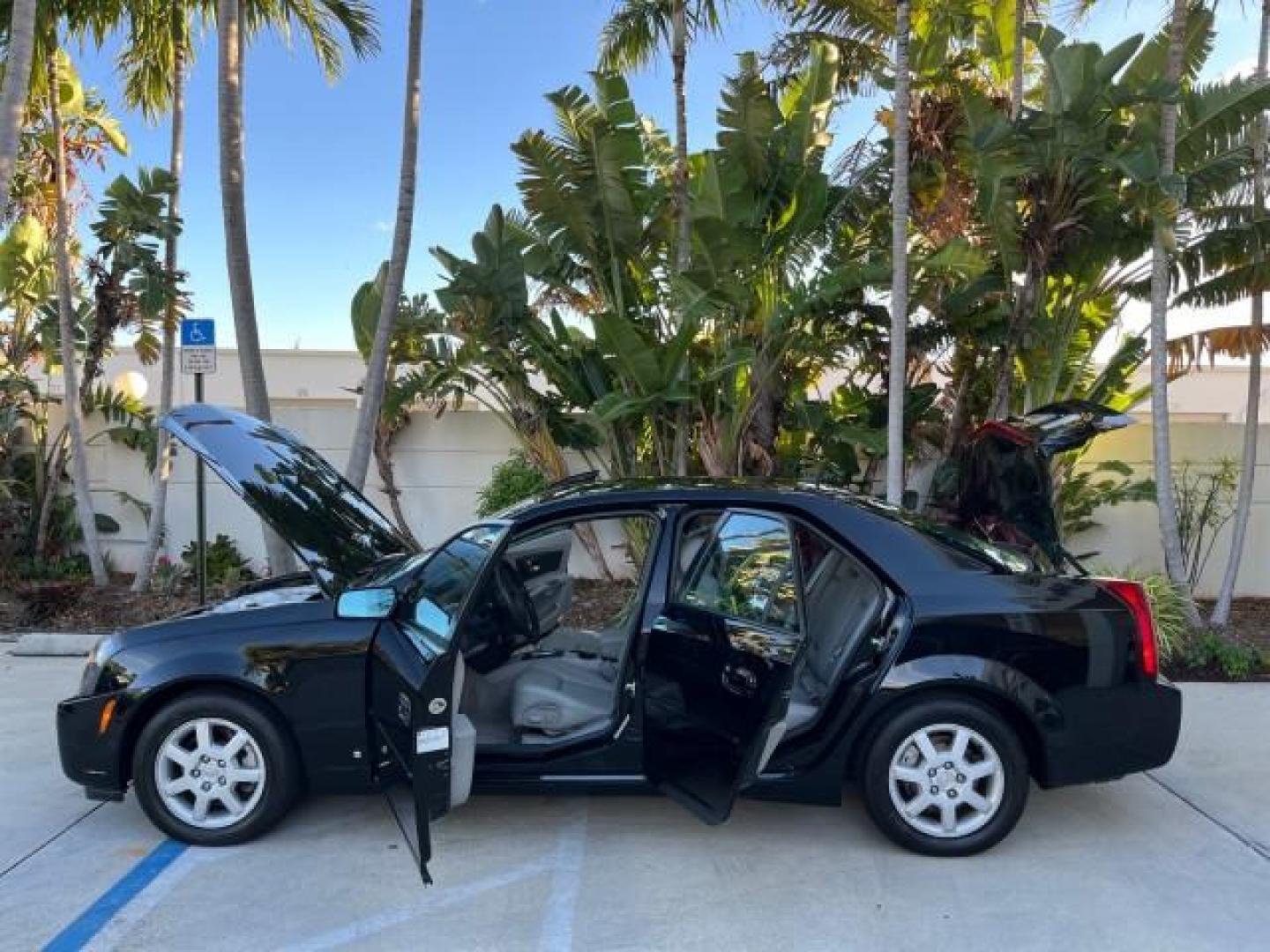 2006 Black Raven /Lt Gray Cadillac CTS SEDAN LOW MILES 42,924 (1G6DM57T260) with an 2.8L DOHC V6 Engine engine, Automatic transmission, located at 4701 North Dixie Hwy, Pompano Beach, FL, 33064, (954) 422-2889, 26.240938, -80.123474 - OUR WEBPAGE FLORIDACARS1.COM HAS OVER 100 PHOTOS AND FREE CARFAX LINK 2006 CADILLAC CTS NEW $32,210 ROAD READY VIN: 1G6DM57T260159097 LOW MILES 42,924 SEDAN 4 DR NO ACCIDENTS 2.8L V6 F POWER HEATED SEATS/MIRRORS GASOLINE DUAL ZONE AC 27 MPG REAR WHEEL DRIVE 8 SERVICE RECORDS Anti-Theft System Approa - Photo#8