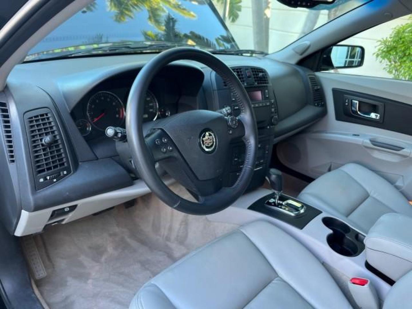 2006 Black Raven /Lt Gray Cadillac CTS SEDAN LOW MILES 42,924 (1G6DM57T260) with an 2.8L DOHC V6 Engine engine, Automatic transmission, located at 4701 North Dixie Hwy, Pompano Beach, FL, 33064, (954) 422-2889, 26.240938, -80.123474 - OUR WEBPAGE FLORIDACARS1.COM HAS OVER 100 PHOTOS AND FREE CARFAX LINK 2006 CADILLAC CTS NEW $32,210 ROAD READY VIN: 1G6DM57T260159097 LOW MILES 42,924 SEDAN 4 DR NO ACCIDENTS 2.8L V6 F POWER HEATED SEATS/MIRRORS GASOLINE DUAL ZONE AC 27 MPG REAR WHEEL DRIVE 8 SERVICE RECORDS Anti-Theft System Approa - Photo#38