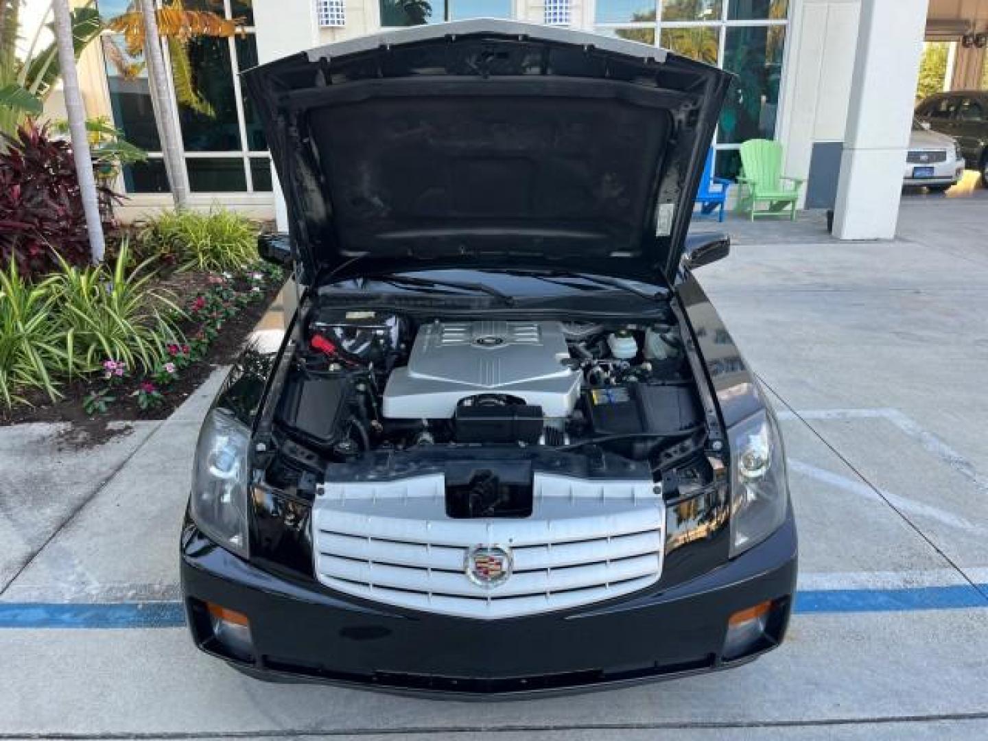 2006 Black Raven /Lt Gray Cadillac CTS SEDAN LOW MILES 42,924 (1G6DM57T260) with an 2.8L DOHC V6 Engine engine, Automatic transmission, located at 4701 North Dixie Hwy, Pompano Beach, FL, 33064, (954) 422-2889, 26.240938, -80.123474 - OUR WEBPAGE FLORIDACARS1.COM HAS OVER 100 PHOTOS AND FREE CARFAX LINK 2006 CADILLAC CTS NEW $32,210 ROAD READY VIN: 1G6DM57T260159097 LOW MILES 42,924 SEDAN 4 DR NO ACCIDENTS 2.8L V6 F POWER HEATED SEATS/MIRRORS GASOLINE DUAL ZONE AC 27 MPG REAR WHEEL DRIVE 8 SERVICE RECORDS Anti-Theft System Approa - Photo#57