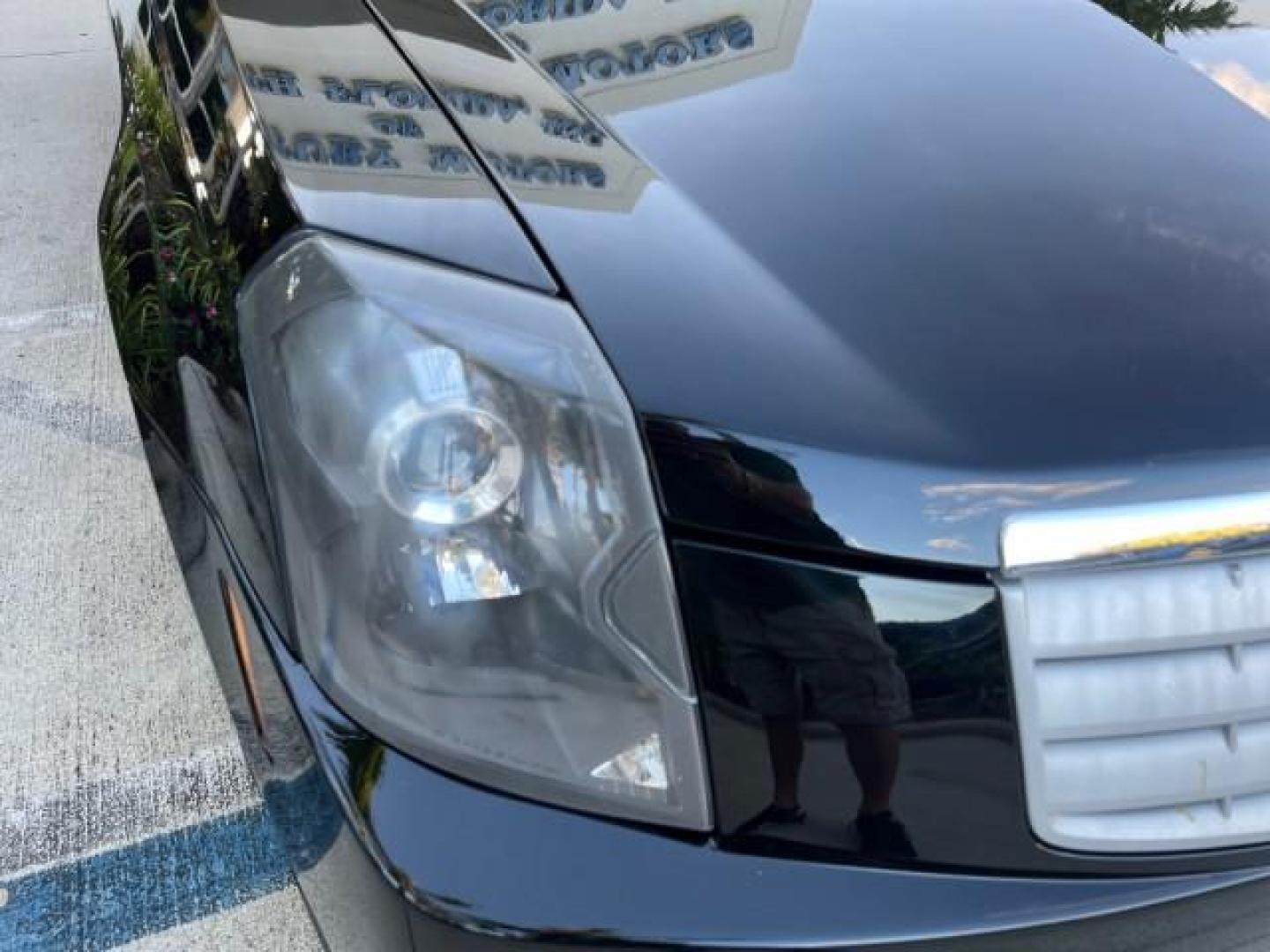 2006 Black Raven /Lt Gray Cadillac CTS SEDAN LOW MILES 42,924 (1G6DM57T260) with an 2.8L DOHC V6 Engine engine, Automatic transmission, located at 4701 North Dixie Hwy, Pompano Beach, FL, 33064, (954) 422-2889, 26.240938, -80.123474 - OUR WEBPAGE FLORIDACARS1.COM HAS OVER 100 PHOTOS AND FREE CARFAX LINK 2006 CADILLAC CTS NEW $32,210 ROAD READY VIN: 1G6DM57T260159097 LOW MILES 42,924 SEDAN 4 DR NO ACCIDENTS 2.8L V6 F POWER HEATED SEATS/MIRRORS GASOLINE DUAL ZONE AC 27 MPG REAR WHEEL DRIVE 8 SERVICE RECORDS Anti-Theft System Approa - Photo#65