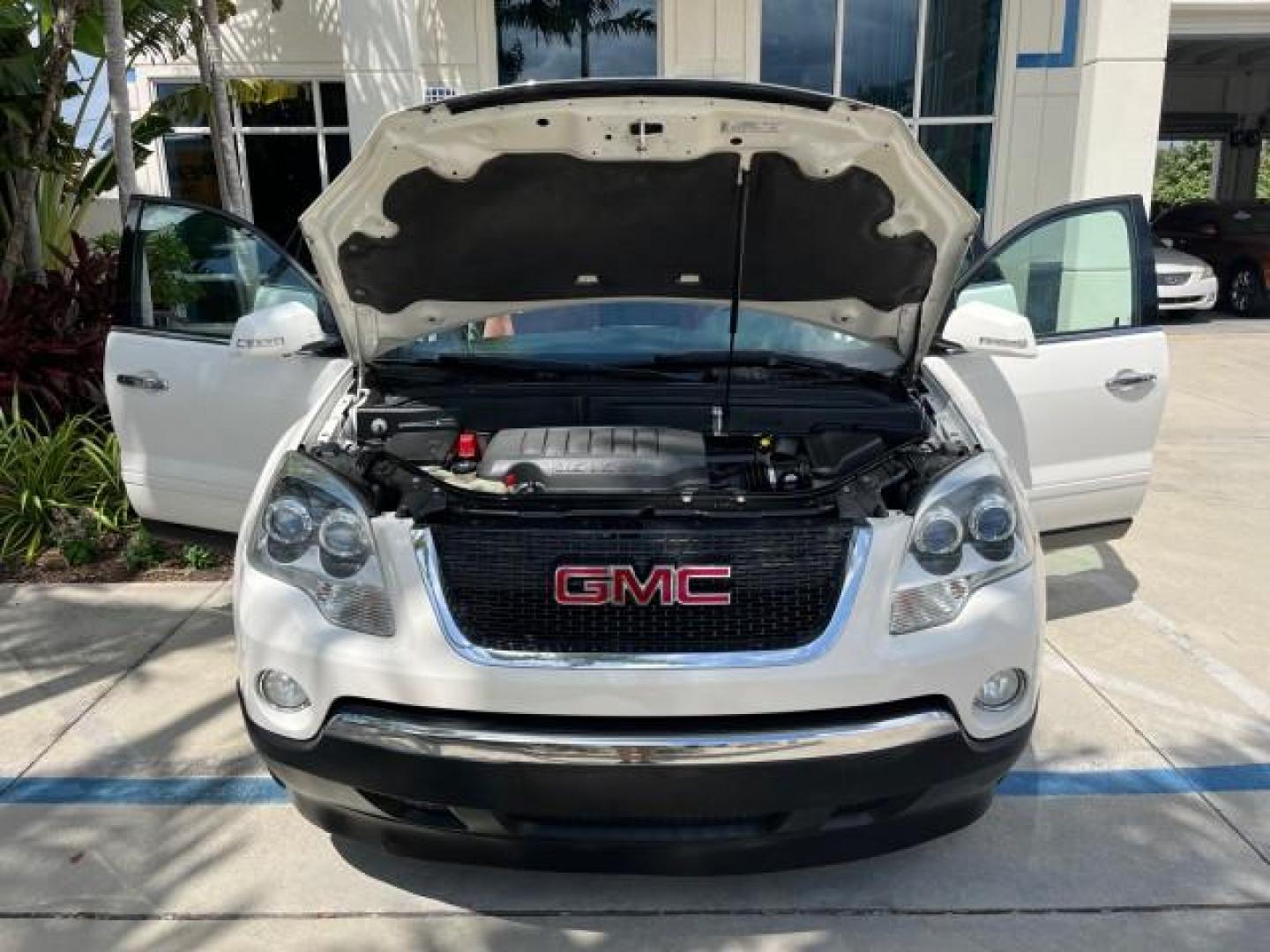 2007 White Diamond Tricoat /Brick GMC Acadia RED LEATHER SLT LOW MILES 74,335 (1GKER33727J) with an 3.6L VVT V6 MPFI Engine engine, Automatic transmission, located at 4701 North Dixie Hwy, Pompano Beach, FL, 33064, (954) 422-2889, 26.240938, -80.123474 - 2007 GMC ACADIA SLT-2 NEW $ 36,800 REAR DVD ENTERTAINMENT VIN: 1GKER33727J116900 NO ACCIDENTS NO RECALLS 4 DOOR WAGON/SPORT UTILITY 3 ROW SEATS BLUETOOTH 3.6L V6 F POWER MEMORI HEATED SEATS GASOLINE POWER REAR DOOR DUAL ZONE AC 3.6L V6 FRONT WHEEL DRIVE LOW MILES 74,335 BACK UP SENSORS Adjustable Lu - Photo#16