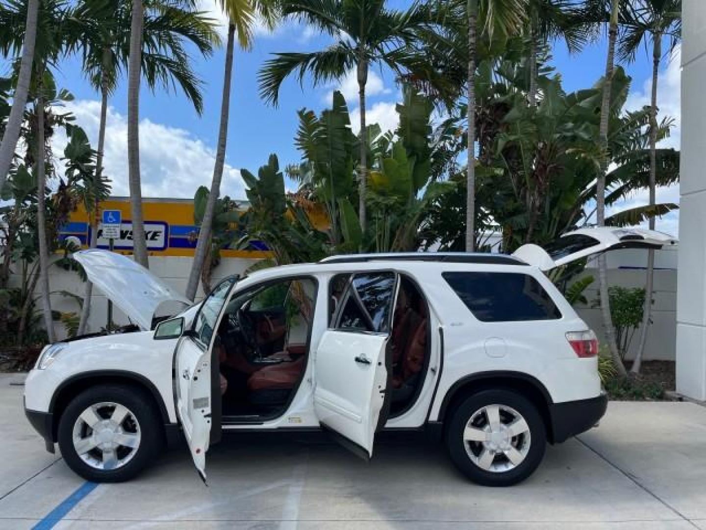 2007 White Diamond Tricoat /Brick GMC Acadia RED LEATHER SLT LOW MILES 74,335 (1GKER33727J) with an 3.6L VVT V6 MPFI Engine engine, Automatic transmission, located at 4701 North Dixie Hwy, Pompano Beach, FL, 33064, (954) 422-2889, 26.240938, -80.123474 - 2007 GMC ACADIA SLT-2 NEW $ 36,800 REAR DVD ENTERTAINMENT VIN: 1GKER33727J116900 NO ACCIDENTS NO RECALLS 4 DOOR WAGON/SPORT UTILITY 3 ROW SEATS BLUETOOTH 3.6L V6 F POWER MEMORI HEATED SEATS GASOLINE POWER REAR DOOR DUAL ZONE AC 3.6L V6 FRONT WHEEL DRIVE LOW MILES 74,335 BACK UP SENSORS Adjustable Lu - Photo#8