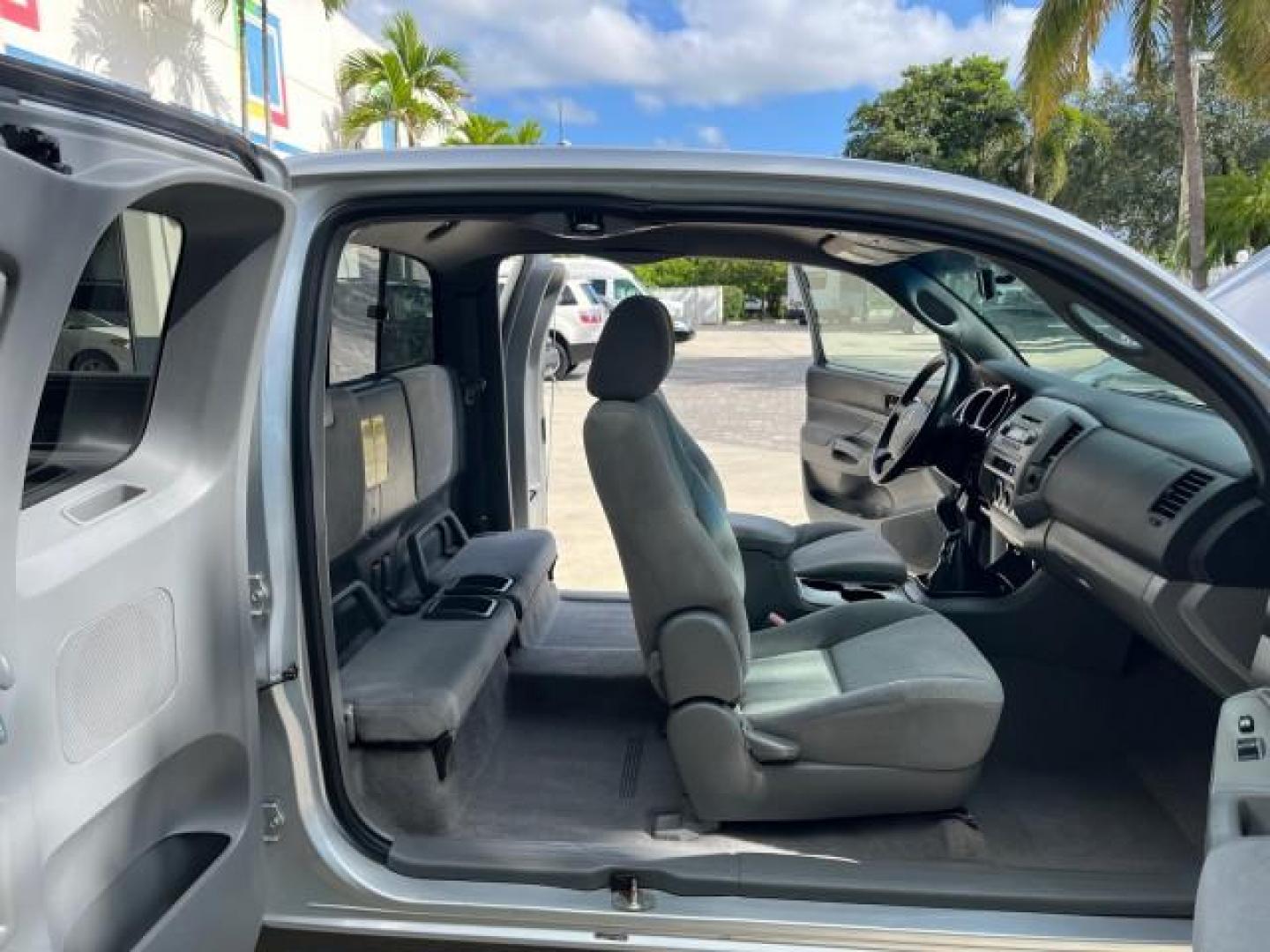 2006 Silver Streak Mica /Graphite Toyota Tacoma 4X4 5 SPD 1 FL LOW MILES 80,046 (5TEUX42N06Z) with an 2.7L DOHC EFI 16-Valve I4 VVT-i Engine engine, Manual transmission, located at 4701 North Dixie Hwy, Pompano Beach, FL, 33064, (954) 422-2889, 26.240938, -80.123474 - 2006 TOYOTA TACOMA ROAD READY 6,2FT BED VIN: 5TEUX42N06Z318321 NO ACCIDENTS CLUB CAB PICKUP NO RECALLS 4X4 2.7L I4 F DOHC 16V 1 FLORIDA OWNER GASOLINE 20 SERVICE RECORDS REAR WHEEL DRIVE W/ 4X4 5 SPD LOW MILES 80,046 THIS IS ONE OF THE NICEST TACOMA S WE HAVE EVER LISTED RETIREE FLORIDA TITLE THIS I - Photo#12