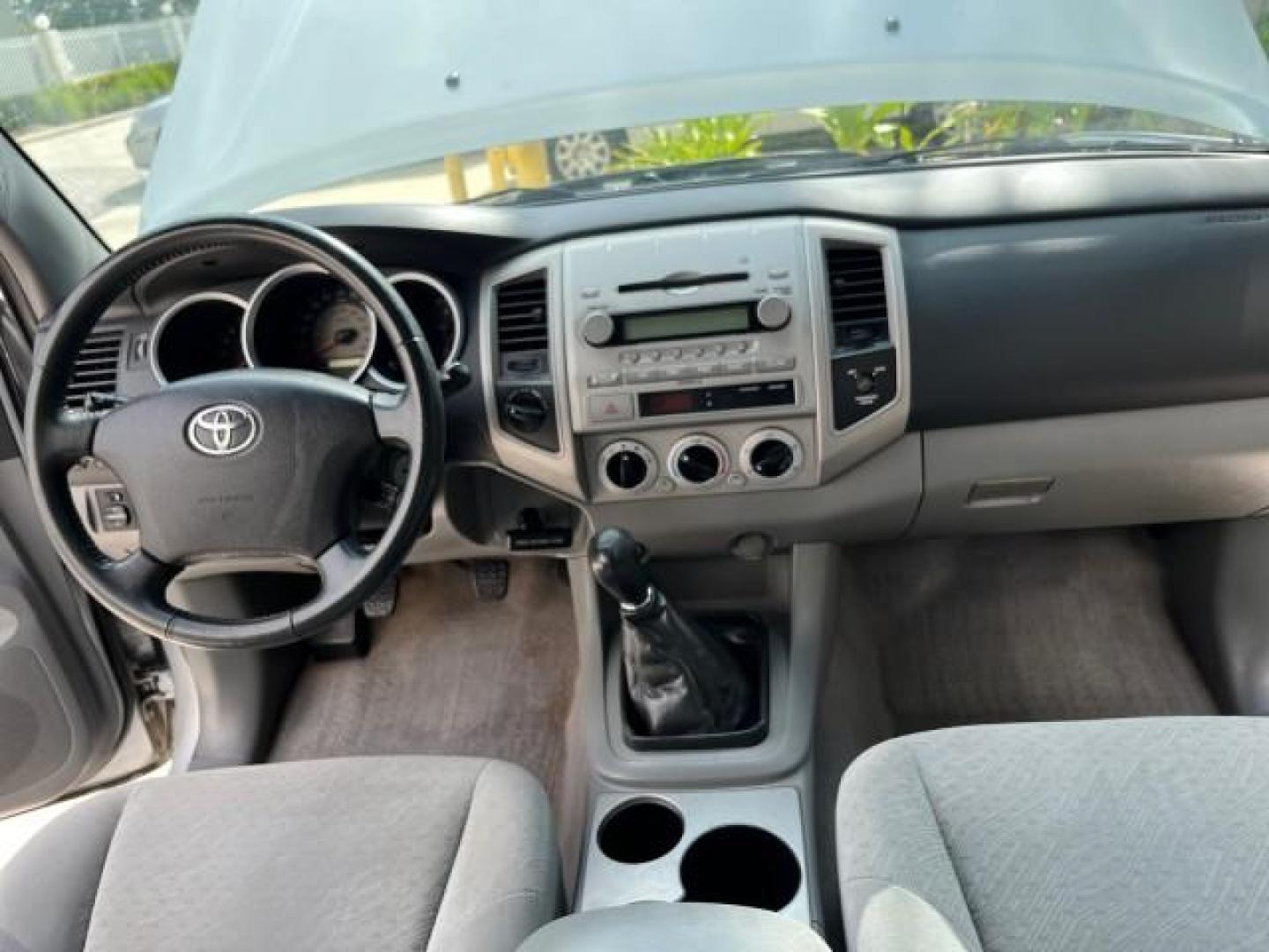 2006 Silver Streak Mica /Graphite Toyota Tacoma 4X4 5 SPD 1 FL LOW MILES 80,046 (5TEUX42N06Z) with an 2.7L DOHC EFI 16-Valve I4 VVT-i Engine engine, Manual transmission, located at 4701 North Dixie Hwy, Pompano Beach, FL, 33064, (954) 422-2889, 26.240938, -80.123474 - 2006 TOYOTA TACOMA ROAD READY 6,2FT BED VIN: 5TEUX42N06Z318321 NO ACCIDENTS CLUB CAB PICKUP NO RECALLS 4X4 2.7L I4 F DOHC 16V 1 FLORIDA OWNER GASOLINE 20 SERVICE RECORDS REAR WHEEL DRIVE W/ 4X4 5 SPD LOW MILES 80,046 THIS IS ONE OF THE NICEST TACOMA S WE HAVE EVER LISTED RETIREE FLORIDA TITLE THIS I - Photo#30