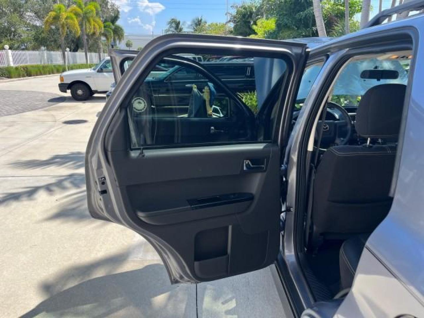 2008 Monterey Gray /Dark Chocolate Mazda Tribute AWD 1 Sport LOW MILES 65,165 (4F2CZ96128K) with an 3.0L DOHC SMPI 24-Valve V6 Engine engine, Automatic transmission, located at 4701 North Dixie Hwy, Pompano Beach, FL, 33064, (954) 422-2889, 26.240938, -80.123474 - 2008 MAZDA TRIBUTE S SPORT AWD NEW $ 30,787 ROAD READY VIN: 4F2CZ96128KM10354 NO RECALLS 4X4 AWD 4 DOOR WAGON/SPORT UTILITY POWER SEATS POWER MIRRORS 3.0L V6 F DOHC 24V LOW MILES 65,165 GASOLINE 1 OWNER POWER SUNROOF FRONT WHEEL DRIVE W/ 4X4 25 SERVICE RECORDS AWD Anti-Theft System Braking Assist Cr - Photo#13