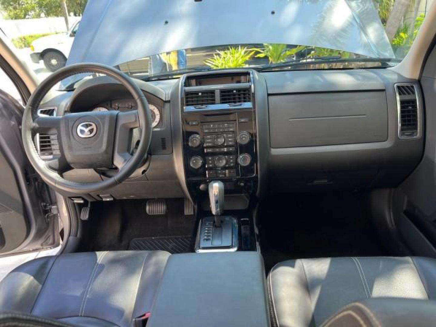 2008 Monterey Gray /Dark Chocolate Mazda Tribute AWD 1 Sport LOW MILES 65,165 (4F2CZ96128K) with an 3.0L DOHC SMPI 24-Valve V6 Engine engine, Automatic transmission, located at 4701 North Dixie Hwy, Pompano Beach, FL, 33064, (954) 422-2889, 26.240938, -80.123474 - 2008 MAZDA TRIBUTE S SPORT AWD NEW $ 30,787 ROAD READY VIN: 4F2CZ96128KM10354 NO RECALLS 4X4 AWD 4 DOOR WAGON/SPORT UTILITY POWER SEATS POWER MIRRORS 3.0L V6 F DOHC 24V LOW MILES 65,165 GASOLINE 1 OWNER POWER SUNROOF FRONT WHEEL DRIVE W/ 4X4 25 SERVICE RECORDS AWD Anti-Theft System Braking Assist Cr - Photo#30