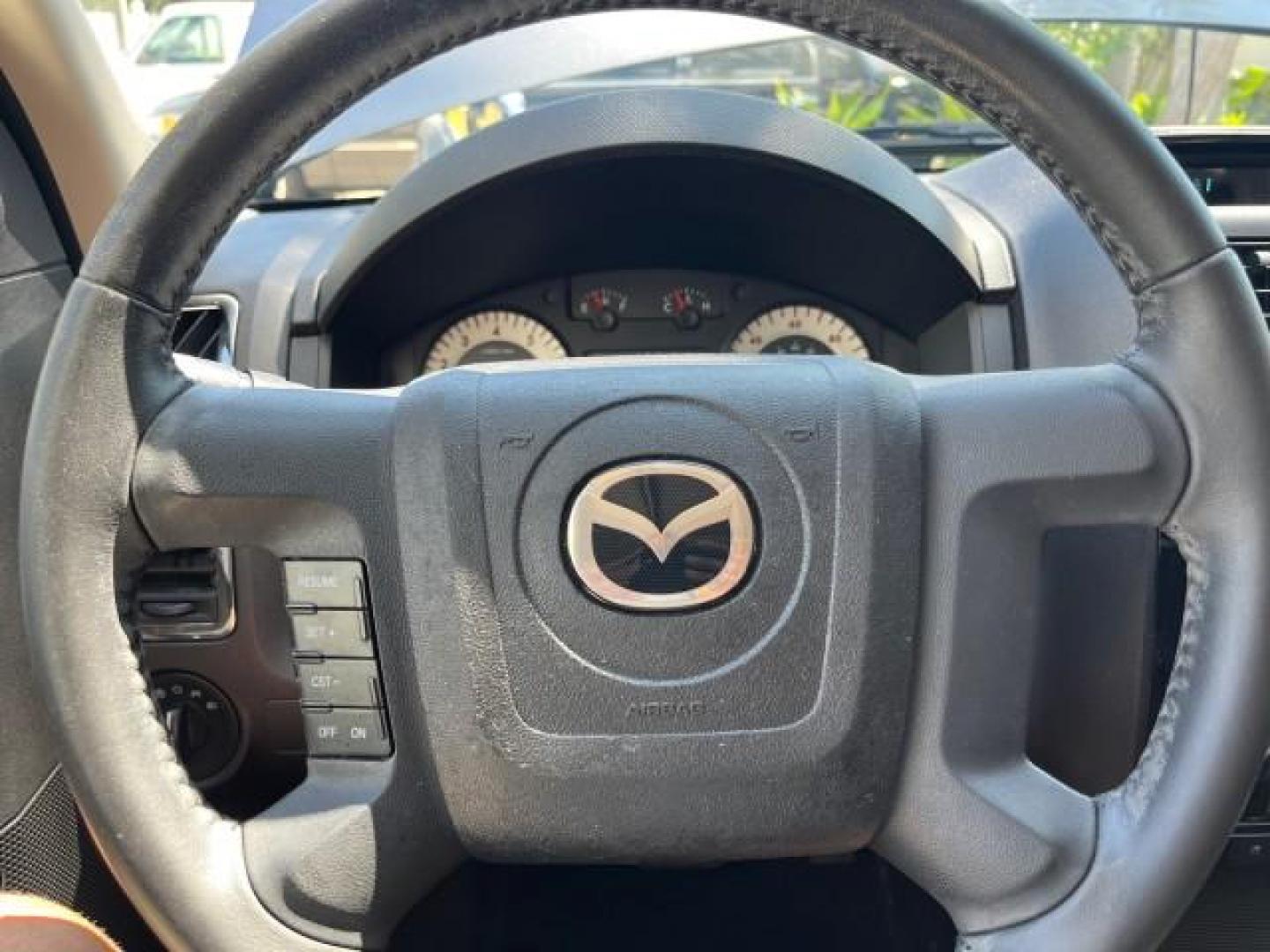 2008 Monterey Gray /Dark Chocolate Mazda Tribute AWD 1 Sport LOW MILES 65,165 (4F2CZ96128K) with an 3.0L DOHC SMPI 24-Valve V6 Engine engine, Automatic transmission, located at 4701 North Dixie Hwy, Pompano Beach, FL, 33064, (954) 422-2889, 26.240938, -80.123474 - 2008 MAZDA TRIBUTE S SPORT AWD NEW $ 30,787 ROAD READY VIN: 4F2CZ96128KM10354 NO RECALLS 4X4 AWD 4 DOOR WAGON/SPORT UTILITY POWER SEATS POWER MIRRORS 3.0L V6 F DOHC 24V LOW MILES 65,165 GASOLINE 1 OWNER POWER SUNROOF FRONT WHEEL DRIVE W/ 4X4 25 SERVICE RECORDS AWD Anti-Theft System Braking Assist Cr - Photo#38