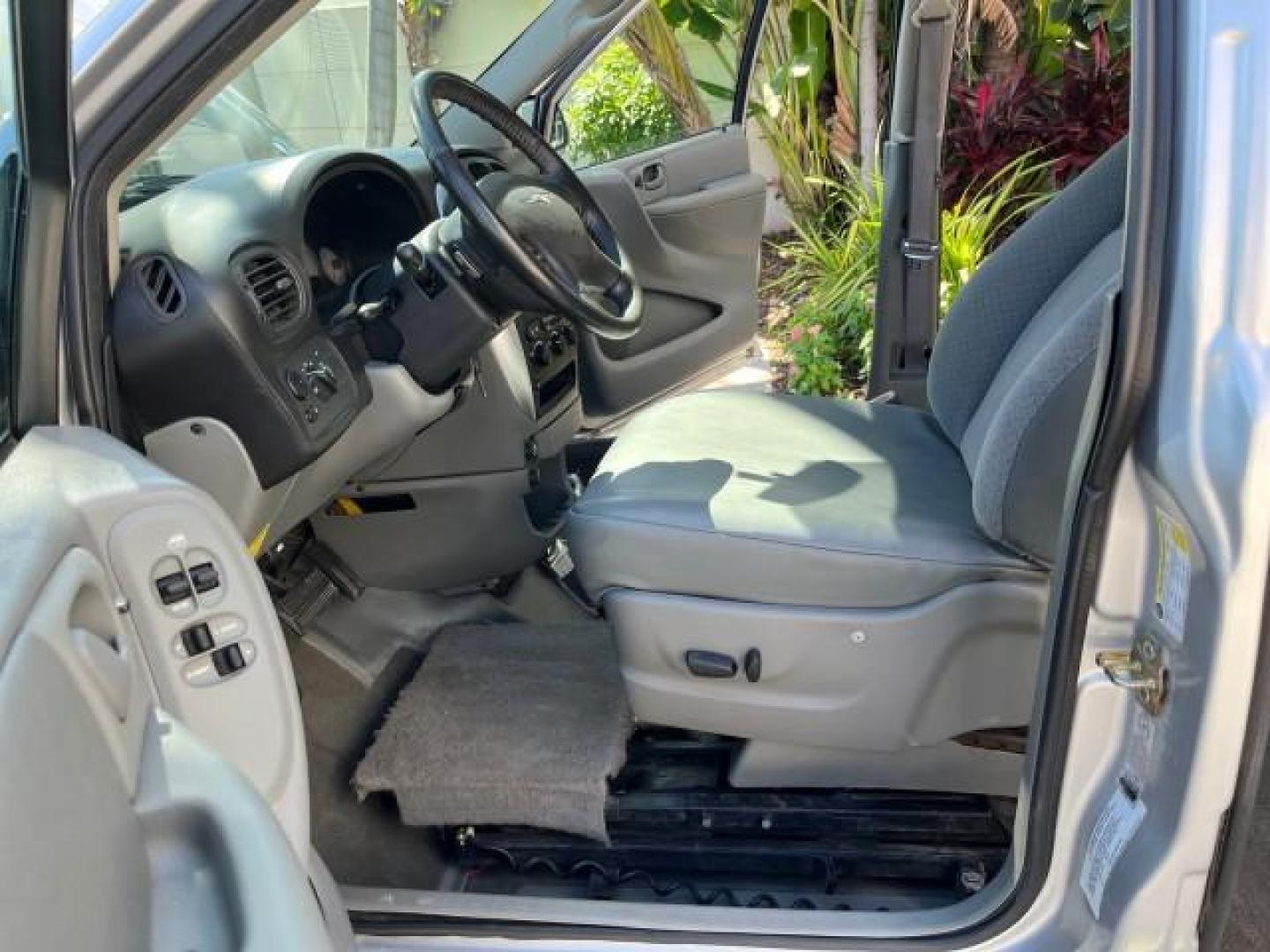 2006 Bright Silver Metallic /Med Slate Gray Chrysler Town and Country LWB BRAUN ENTERVAN LO MI 26,135 (2A4GP54L56R) with an 3.8L OHV V6 Engine engine, Automatic transmission, located at 4701 North Dixie Hwy, Pompano Beach, FL, 33064, (954) 422-2889, 26.240938, -80.123474 - 2006 CHRYSLER TOWN AND COUNTRY TOURING ROAD READY DUAL ZONE AC VIN: 2A4GP54L56R807859 NO RECALLS VAN POWER SLIDING DOORS 3.8L V6 F 24V POWER SEATS/MIRRORS GASOLINE LOW MILES 26,135 FRONT WHEEL DRIVE POWER HANDICAP RAMP BRAUN ENTERVAN $30.000 LOWERED FLOOR CONVERSION WORKS GREAT ! Additional Airbags - Photo#10