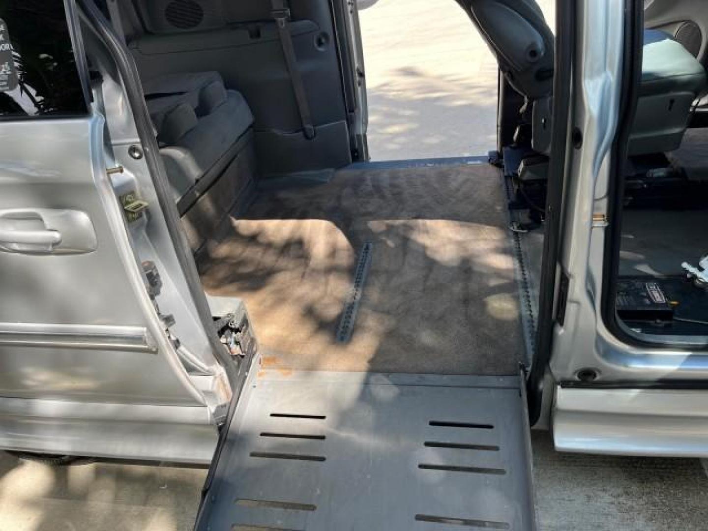 2006 Bright Silver Metallic /Med Slate Gray Chrysler Town and Country LWB BRAUN ENTERVAN LO MI 26,135 (2A4GP54L56R) with an 3.8L OHV V6 Engine engine, Automatic transmission, located at 4701 North Dixie Hwy, Pompano Beach, FL, 33064, (954) 422-2889, 26.240938, -80.123474 - 2006 CHRYSLER TOWN AND COUNTRY TOURING ROAD READY DUAL ZONE AC VIN: 2A4GP54L56R807859 NO RECALLS VAN POWER SLIDING DOORS 3.8L V6 F 24V POWER SEATS/MIRRORS GASOLINE LOW MILES 26,135 FRONT WHEEL DRIVE POWER HANDICAP RAMP BRAUN ENTERVAN $30.000 LOWERED FLOOR CONVERSION WORKS GREAT ! Additional Airbags - Photo#14