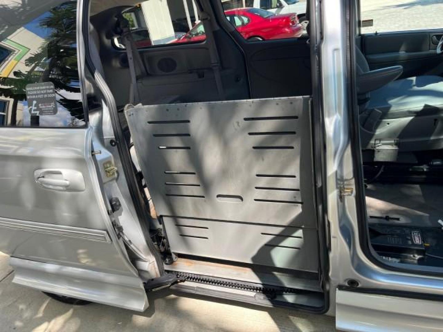 2006 Bright Silver Metallic /Med Slate Gray Chrysler Town and Country LWB BRAUN ENTERVAN LO MI 26,135 (2A4GP54L56R) with an 3.8L OHV V6 Engine engine, Automatic transmission, located at 4701 North Dixie Hwy, Pompano Beach, FL, 33064, (954) 422-2889, 26.240938, -80.123474 - 2006 CHRYSLER TOWN AND COUNTRY TOURING ROAD READY DUAL ZONE AC VIN: 2A4GP54L56R807859 NO RECALLS VAN POWER SLIDING DOORS 3.8L V6 F 24V POWER SEATS/MIRRORS GASOLINE LOW MILES 26,135 FRONT WHEEL DRIVE POWER HANDICAP RAMP BRAUN ENTERVAN $30.000 LOWERED FLOOR CONVERSION WORKS GREAT ! Additional Airbags - Photo#65