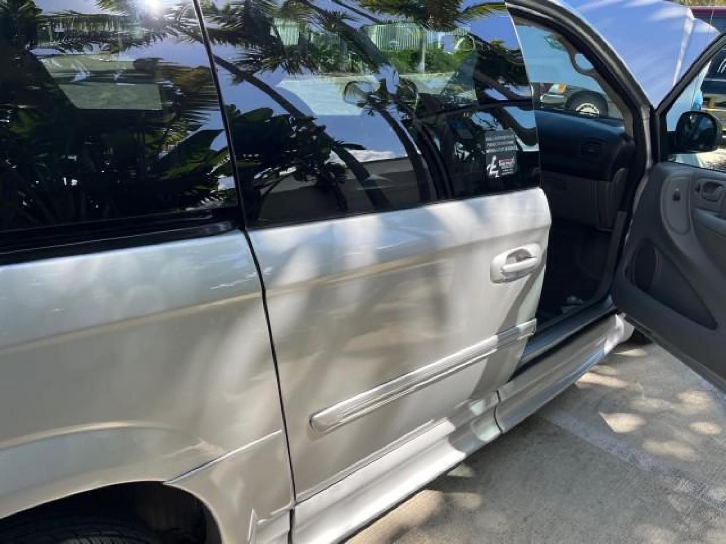 2006 Bright Silver Metallic /Med Slate Gray Chrysler Town and Country LWB BRAUN ENTERVAN LO MI 26,135 (2A4GP54L56R) with an 3.8L OHV V6 Engine engine, Automatic transmission, located at 4701 North Dixie Hwy, Pompano Beach, FL, 33064, (954) 422-2889, 26.240938, -80.123474 - 2006 CHRYSLER TOWN AND COUNTRY TOURING ROAD READY DUAL ZONE AC VIN: 2A4GP54L56R807859 NO RECALLS VAN POWER SLIDING DOORS 3.8L V6 F 24V POWER SEATS/MIRRORS GASOLINE LOW MILES 26,135 FRONT WHEEL DRIVE POWER HANDICAP RAMP BRAUN ENTERVAN $30.000 LOWERED FLOOR CONVERSION WORKS GREAT ! Additional Airbags - Photo#75