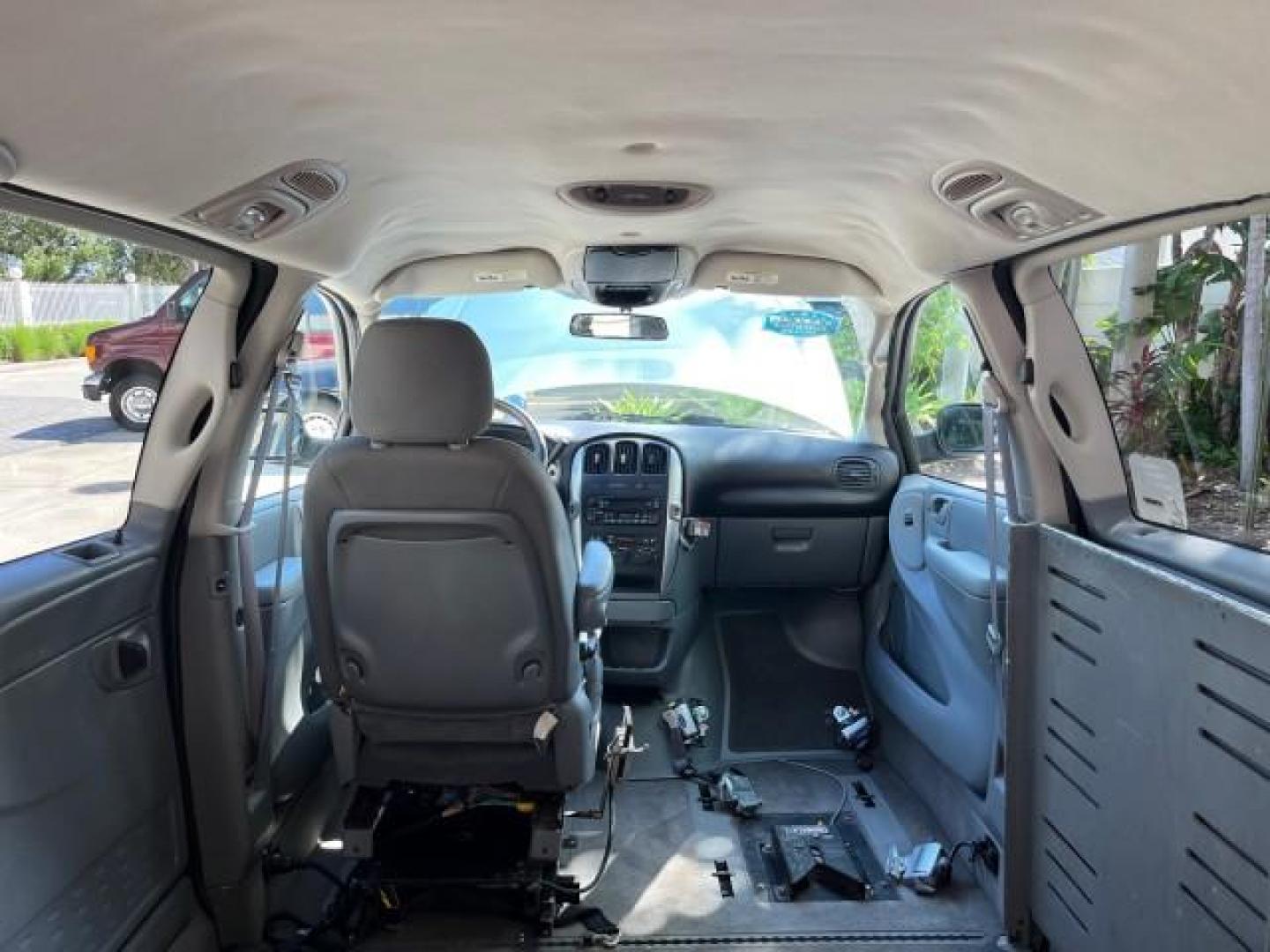 2006 Bright Silver Metallic /Med Slate Gray Chrysler Town and Country LWB BRAUN ENTERVAN LO MI 26,135 (2A4GP54L56R) with an 3.8L OHV V6 Engine engine, Automatic transmission, located at 4701 North Dixie Hwy, Pompano Beach, FL, 33064, (954) 422-2889, 26.240938, -80.123474 - 2006 CHRYSLER TOWN AND COUNTRY TOURING ROAD READY DUAL ZONE AC VIN: 2A4GP54L56R807859 NO RECALLS VAN POWER SLIDING DOORS 3.8L V6 F 24V POWER SEATS/MIRRORS GASOLINE LOW MILES 26,135 FRONT WHEEL DRIVE POWER HANDICAP RAMP BRAUN ENTERVAN $30.000 LOWERED FLOOR CONVERSION WORKS GREAT ! Additional Airbags - Photo#79