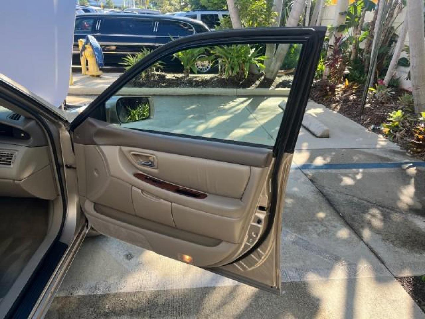 2004 Desert Sand Mica /Ivory Toyota Avalon XLS LOW MILES 64,294 (4T1BF28B54U) with an 3.0L DOHC MPFI 24-Valve V6 Engine engine, Automatic transmission, located at 4701 North Dixie Hwy, Pompano Beach, FL, 33064, (954) 422-2889, 26.240938, -80.123474 - 2004 TOYOTA AVALON XLS BUCKET LEATHER SEATS CENTER CONSOL NEW $ 34,765 25 SERVICE RECORDS VIN: 4T1BF28B54U345415 NO RECALLS LOW MILES 64,294 SEDAN 4 DR FLORIDA OWNER SUNROOF XLS 3.0L V6 F DOHC 24V POWER HEATED MIRRORS JBL SOUND GASOLINE POWER HEATED LEATHER SEATS FRONT WHEEL DRIVE DUAL ZONE AC 29 MP - Photo#11