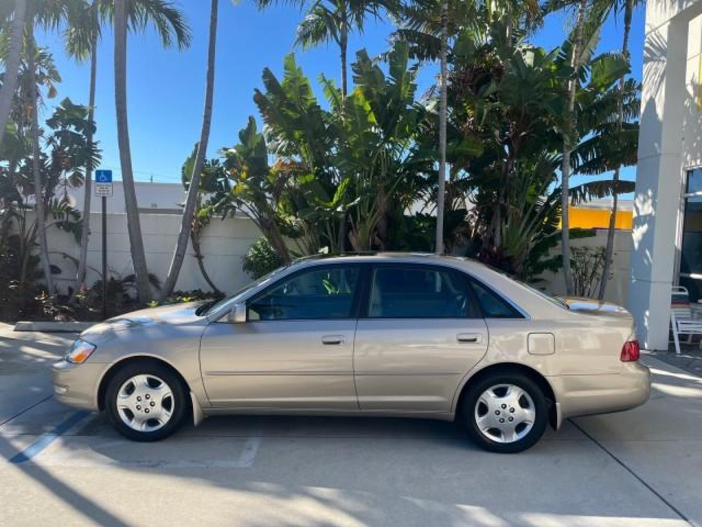 2004 Desert Sand Mica /Ivory Toyota Avalon XLS LOW MILES 64,294 (4T1BF28B54U) with an 3.0L DOHC MPFI 24-Valve V6 Engine engine, Automatic transmission, located at 4701 North Dixie Hwy, Pompano Beach, FL, 33064, (954) 422-2889, 26.240938, -80.123474 - 2004 TOYOTA AVALON XLS BUCKET LEATHER SEATS CENTER CONSOL NEW $ 34,765 25 SERVICE RECORDS VIN: 4T1BF28B54U345415 NO RECALLS LOW MILES 64,294 SEDAN 4 DR FLORIDA OWNER SUNROOF XLS 3.0L V6 F DOHC 24V POWER HEATED MIRRORS JBL SOUND GASOLINE POWER HEATED LEATHER SEATS FRONT WHEEL DRIVE DUAL ZONE AC 29 MP - Photo#4