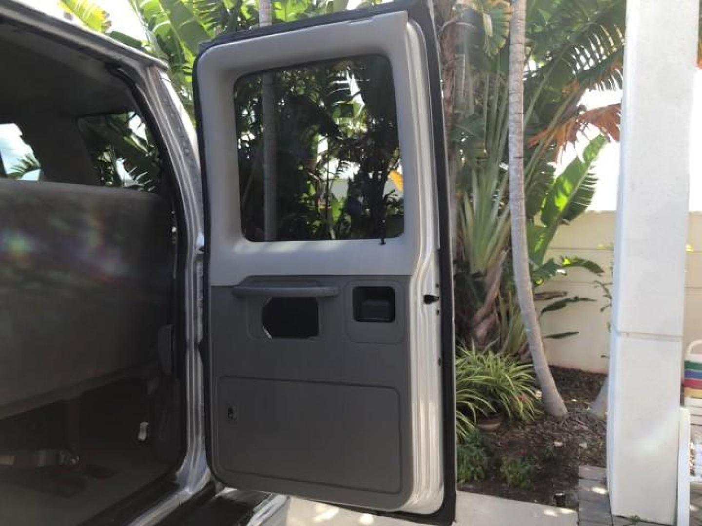 2006 Dark Shadow Grey Metallic /Medium Flint Ford Econoline Wagon 15 PASS XLT LOW MILES 37,845 (1FBSS31L46D) with an 5.4L EFI V8 Engine engine, Automatic transmission, located at 4701 North Dixie Hwy, Pompano Beach, FL, 33064, (954) 422-2889, 26.240938, -80.123474 - 2006 FORD E-SERIES E-350 SD XLT 15 PASS ROAD READY 5.4L V8 XLT VIN: 1FBSS31L46DB29538 NO RECALLS VAN LOW MILES 37,845 5.4L V8 F 15 PASSENGER 5 ROWS OF SEATS GASOLINE 5 SERVICE RECORDS REAR WHEEL DRIVE ABS Brakes AM/FM Stereo Air Conditioning Automatic Transmission Barn Doors CD Audio Cloth Seats Cru - Photo#40