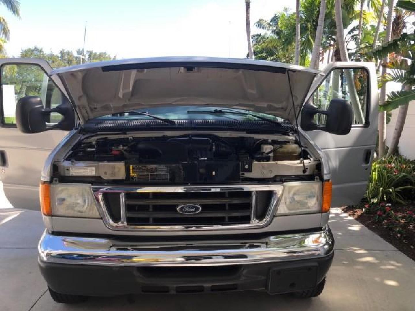 2006 Dark Shadow Grey Metallic /Medium Flint Ford Econoline Wagon 15 PASS XLT LOW MILES 37,845 (1FBSS31L46D) with an 5.4L EFI V8 Engine engine, Automatic transmission, located at 4701 North Dixie Hwy, Pompano Beach, FL, 33064, (954) 422-2889, 26.240938, -80.123474 - 2006 FORD E-SERIES E-350 SD XLT 15 PASS ROAD READY 5.4L V8 XLT VIN: 1FBSS31L46DB29538 NO RECALLS VAN LOW MILES 37,845 5.4L V8 F 15 PASSENGER 5 ROWS OF SEATS GASOLINE 5 SERVICE RECORDS REAR WHEEL DRIVE ABS Brakes AM/FM Stereo Air Conditioning Automatic Transmission Barn Doors CD Audio Cloth Seats Cru - Photo#55