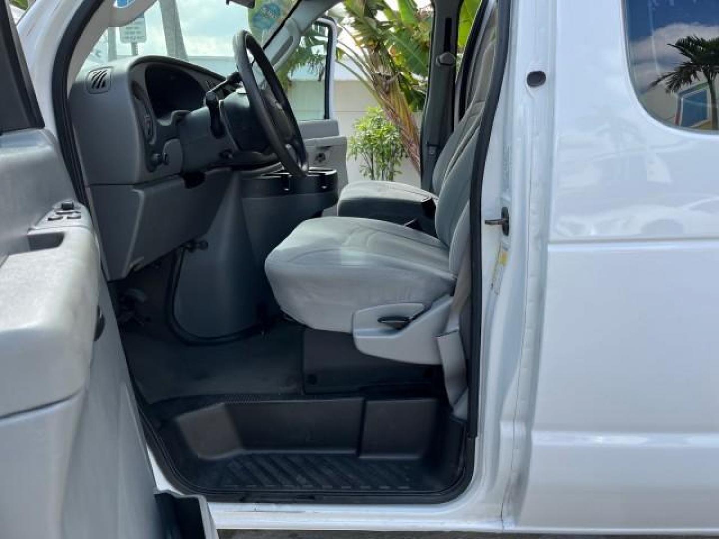 2008 Oxford White /Medium Flint Ford Econoline Wagon E 350 15 XLT LOW MILES 65,995 (1FBSS31L98D) with an 5.4L EFI V8 Engine engine, Automatic transmission, located at 4701 North Dixie Hwy, Pompano Beach, FL, 33064, (954) 422-2889, 26.240938, -80.123474 - 2008 FORD E-SERIES E-350 SD XLT 15 ROAD READY 5,4L V8 VIN: 1FBSS31L98DA44990 NO RECALLS VAN 15 PASSENGER 5.4L V8 F SOHC 16V LOW MILES 65,995 GASOLINE 2 SERVICE RECORDS REAR WHEEL DRIVE POWER MIRRORS ABS Brakes AM/FM Stereo Air Conditioning Automatic Transmission CD Audio Cloth Seats Cruise Control F - Photo#10