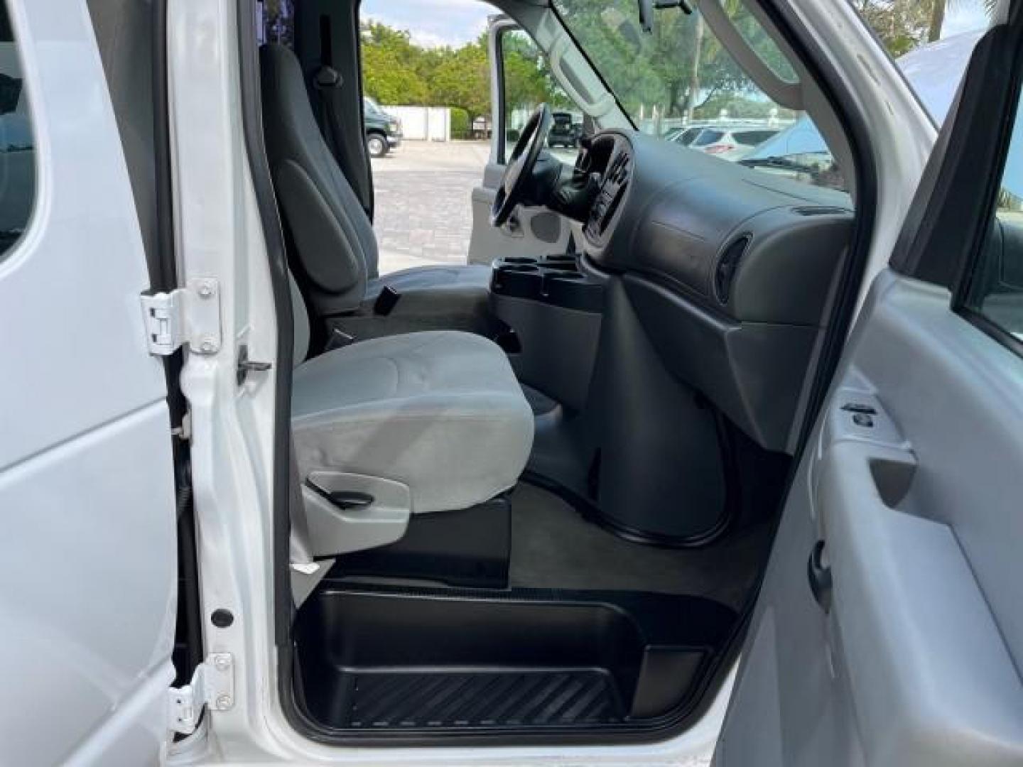 2008 Oxford White /Medium Flint Ford Econoline Wagon E 350 15 XLT LOW MILES 65,995 (1FBSS31L98D) with an 5.4L EFI V8 Engine engine, Automatic transmission, located at 4701 North Dixie Hwy, Pompano Beach, FL, 33064, (954) 422-2889, 26.240938, -80.123474 - 2008 FORD E-SERIES E-350 SD XLT 15 ROAD READY 5,4L V8 VIN: 1FBSS31L98DA44990 NO RECALLS VAN 15 PASSENGER 5.4L V8 F SOHC 16V LOW MILES 65,995 GASOLINE 2 SERVICE RECORDS REAR WHEEL DRIVE POWER MIRRORS ABS Brakes AM/FM Stereo Air Conditioning Automatic Transmission CD Audio Cloth Seats Cruise Control F - Photo#12