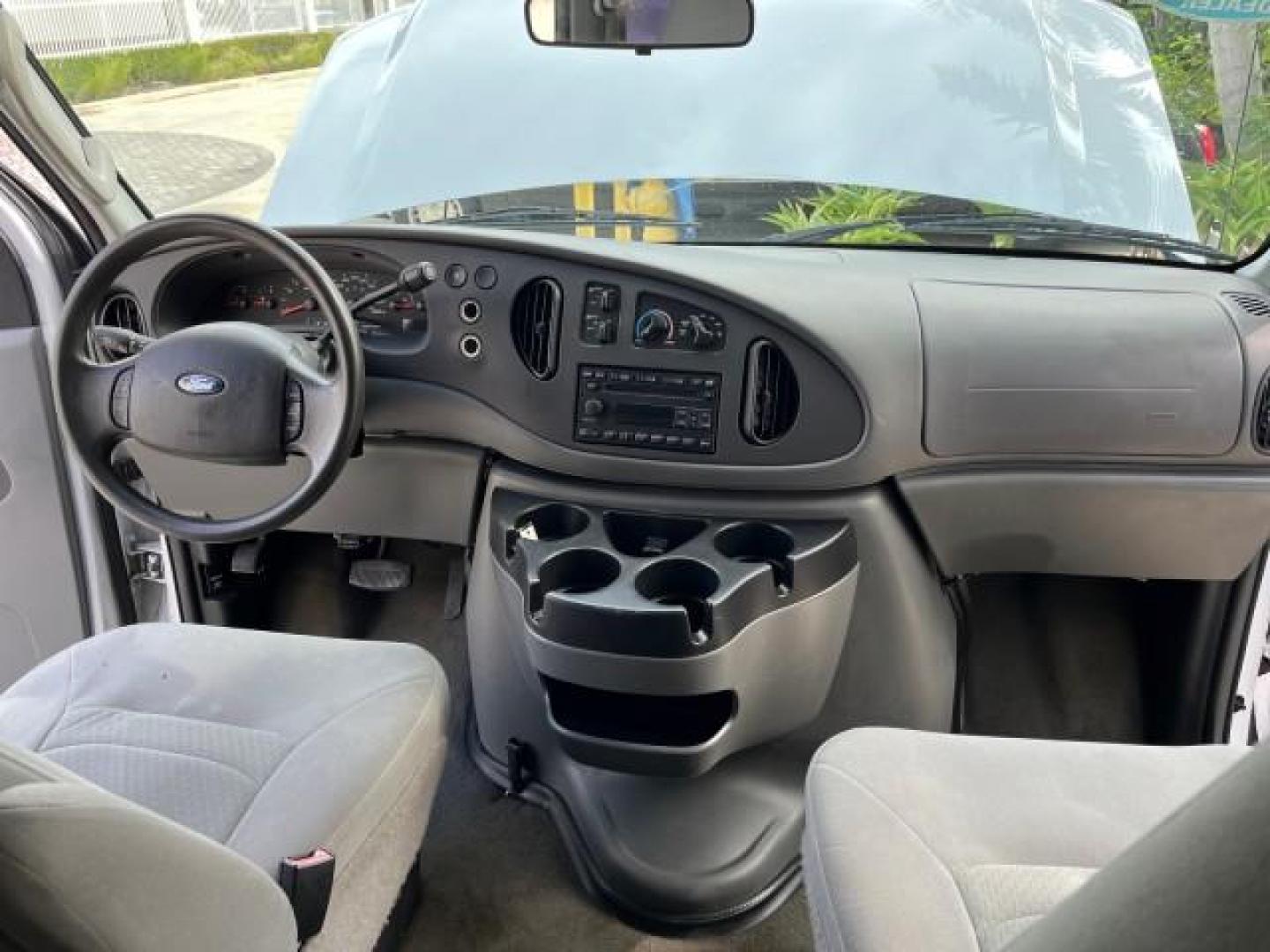 2008 Oxford White /Medium Flint Ford Econoline Wagon E 350 15 XLT LOW MILES 65,995 (1FBSS31L98D) with an 5.4L EFI V8 Engine engine, Automatic transmission, located at 4701 North Dixie Hwy, Pompano Beach, FL, 33064, (954) 422-2889, 26.240938, -80.123474 - 2008 FORD E-SERIES E-350 SD XLT 15 ROAD READY 5,4L V8 VIN: 1FBSS31L98DA44990 NO RECALLS VAN 15 PASSENGER 5.4L V8 F SOHC 16V LOW MILES 65,995 GASOLINE 2 SERVICE RECORDS REAR WHEEL DRIVE POWER MIRRORS ABS Brakes AM/FM Stereo Air Conditioning Automatic Transmission CD Audio Cloth Seats Cruise Control F - Photo#14