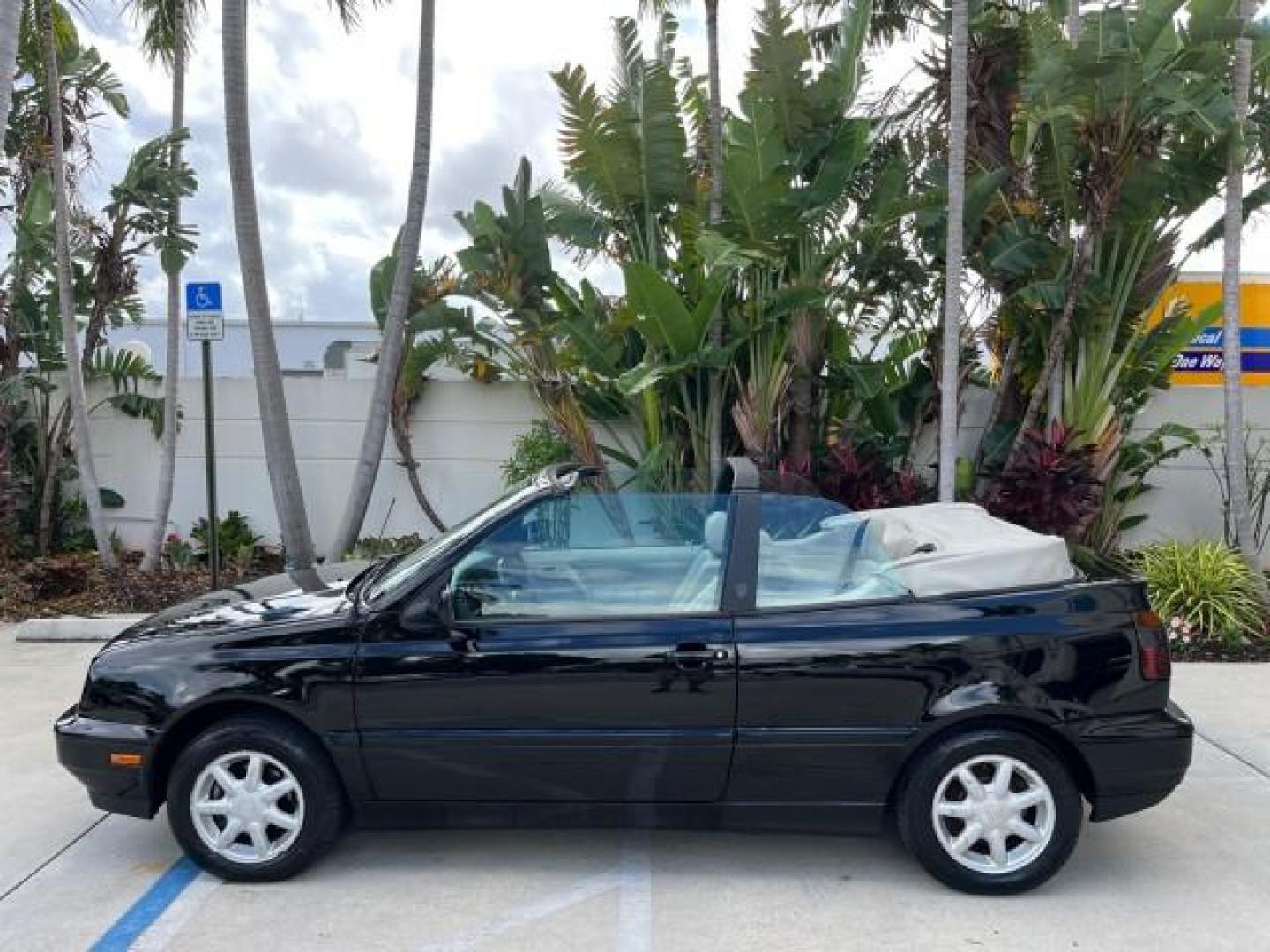 1998 Black /Black Volkswagen Cabrio GLS LOW MILES 69,287 (3VWBA81E3WM) with an 2.0L SOHC SMPI 4-Cyl Engine engine, Automatic transmission, located at 4701 North Dixie Hwy, Pompano Beach, FL, 33064, (954) 422-2889, 26.240938, -80.123474 - 1998 VOLKSWAGEN CABRIO GLS NEW $ 25,676 ROAD READY VIN: 3VWBA81E3WM801328 NO ACCIDENTS 31 MPG 2.0L I4 CONVERTIBLE HEATED LEATHER SEATS 2.0L I4 F POWER CONVERTIBLE TOP GASOLINE 11 SERVICE RECORDS FRONT WHEEL DRIVE POWER MIRRORS LOW MILES 69,287 ABS Brakes AM/FM Stereo Air Conditioning Alloy Wheels Au - Photo#9