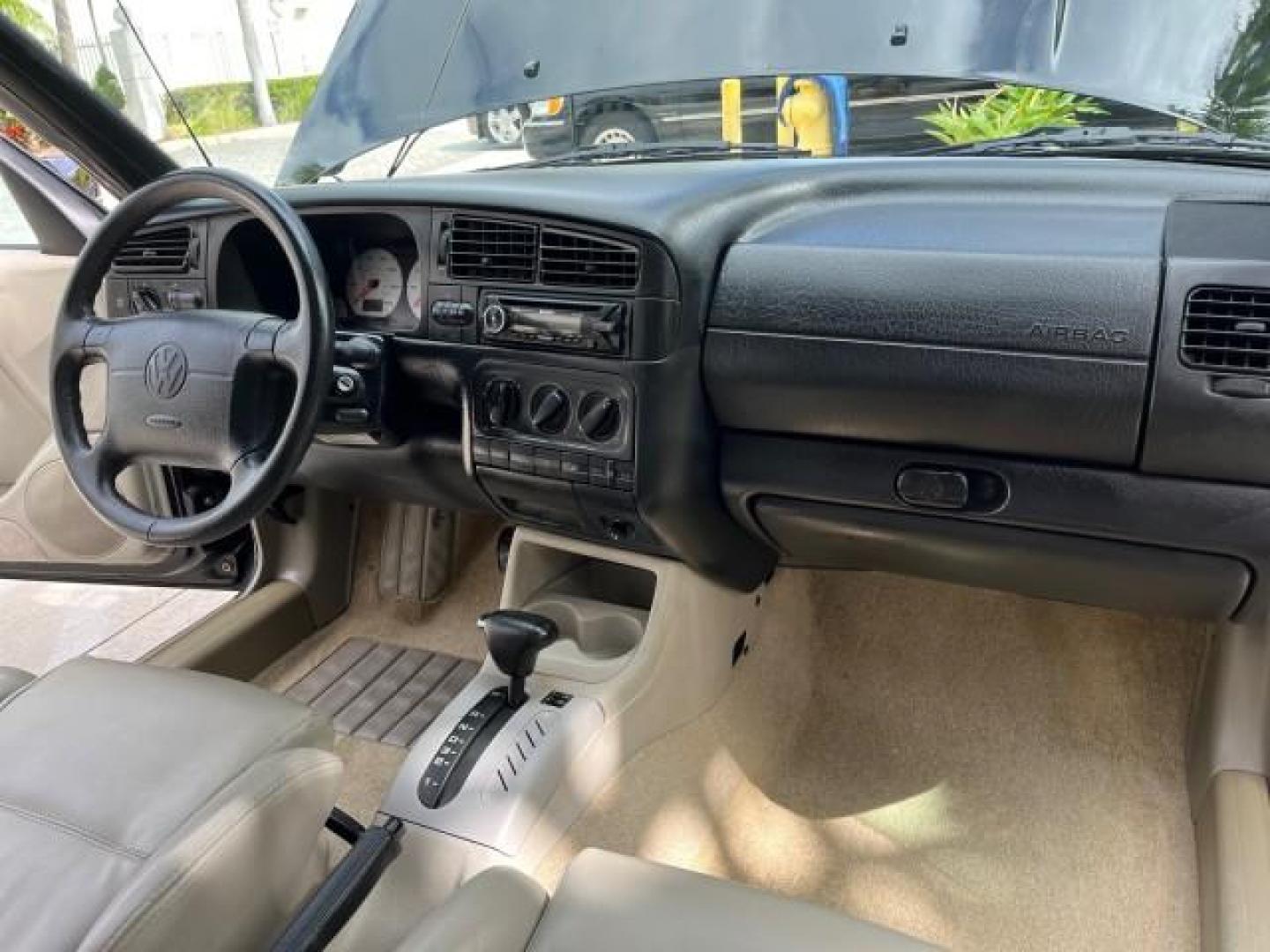 1998 Black /Black Volkswagen Cabrio GLS LOW MILES 69,287 (3VWBA81E3WM) with an 2.0L SOHC SMPI 4-Cyl Engine engine, Automatic transmission, located at 4701 North Dixie Hwy, Pompano Beach, FL, 33064, (954) 422-2889, 26.240938, -80.123474 - 1998 VOLKSWAGEN CABRIO GLS NEW $ 25,676 ROAD READY VIN: 3VWBA81E3WM801328 NO ACCIDENTS 31 MPG 2.0L I4 CONVERTIBLE HEATED LEATHER SEATS 2.0L I4 F POWER CONVERTIBLE TOP GASOLINE 11 SERVICE RECORDS FRONT WHEEL DRIVE POWER MIRRORS LOW MILES 69,287 ABS Brakes AM/FM Stereo Air Conditioning Alloy Wheels Au - Photo#28