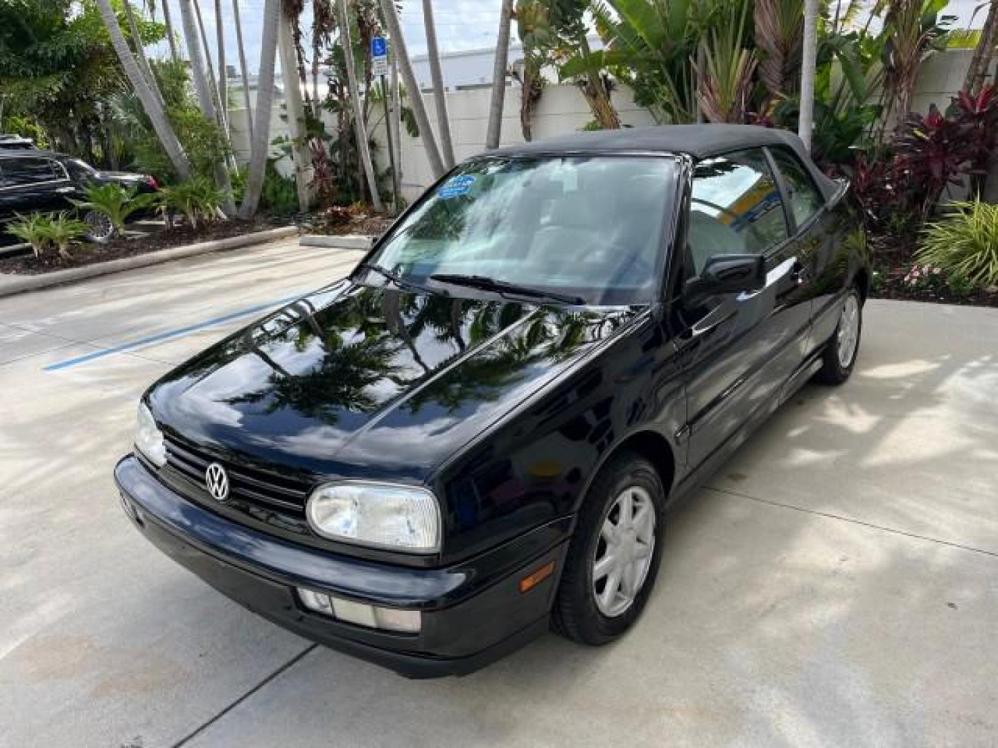 1998 Black /Black Volkswagen Cabrio GLS LOW MILES 69,287 (3VWBA81E3WM) with an 2.0L SOHC SMPI 4-Cyl Engine engine, Automatic transmission, located at 4701 North Dixie Hwy, Pompano Beach, FL, 33064, (954) 422-2889, 26.240938, -80.123474 - 1998 VOLKSWAGEN CABRIO GLS NEW $ 25,676 ROAD READY VIN: 3VWBA81E3WM801328 NO ACCIDENTS 31 MPG 2.0L I4 CONVERTIBLE HEATED LEATHER SEATS 2.0L I4 F POWER CONVERTIBLE TOP GASOLINE 11 SERVICE RECORDS FRONT WHEEL DRIVE POWER MIRRORS LOW MILES 69,287 ABS Brakes AM/FM Stereo Air Conditioning Alloy Wheels Au - Photo#3