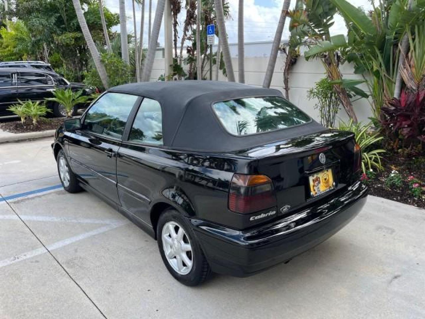 1998 Black /Black Volkswagen Cabrio GLS LOW MILES 69,287 (3VWBA81E3WM) with an 2.0L SOHC SMPI 4-Cyl Engine engine, Automatic transmission, located at 4701 North Dixie Hwy, Pompano Beach, FL, 33064, (954) 422-2889, 26.240938, -80.123474 - 1998 VOLKSWAGEN CABRIO GLS NEW $ 25,676 ROAD READY VIN: 3VWBA81E3WM801328 NO ACCIDENTS 31 MPG 2.0L I4 CONVERTIBLE HEATED LEATHER SEATS 2.0L I4 F POWER CONVERTIBLE TOP GASOLINE 11 SERVICE RECORDS FRONT WHEEL DRIVE POWER MIRRORS LOW MILES 69,287 ABS Brakes AM/FM Stereo Air Conditioning Alloy Wheels Au - Photo#5