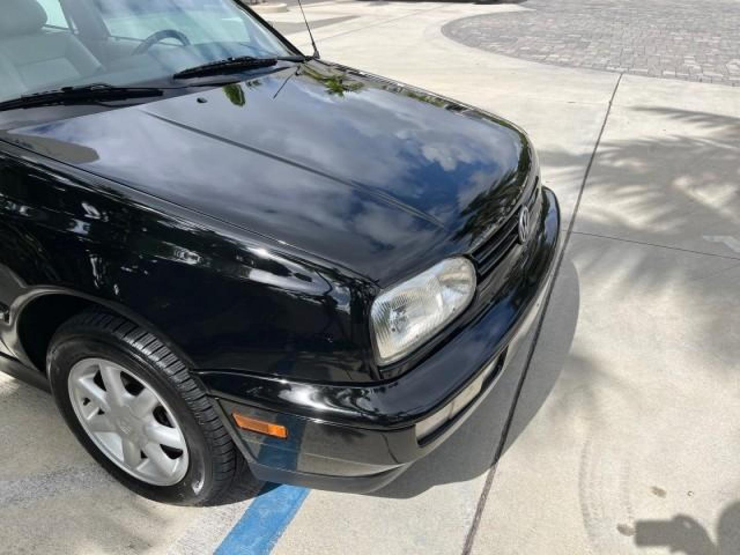 1998 Black /Black Volkswagen Cabrio GLS LOW MILES 69,287 (3VWBA81E3WM) with an 2.0L SOHC SMPI 4-Cyl Engine engine, Automatic transmission, located at 4701 North Dixie Hwy, Pompano Beach, FL, 33064, (954) 422-2889, 26.240938, -80.123474 - 1998 VOLKSWAGEN CABRIO GLS NEW $ 25,676 ROAD READY VIN: 3VWBA81E3WM801328 NO ACCIDENTS 31 MPG 2.0L I4 CONVERTIBLE HEATED LEATHER SEATS 2.0L I4 F POWER CONVERTIBLE TOP GASOLINE 11 SERVICE RECORDS FRONT WHEEL DRIVE POWER MIRRORS LOW MILES 69,287 ABS Brakes AM/FM Stereo Air Conditioning Alloy Wheels Au - Photo#80