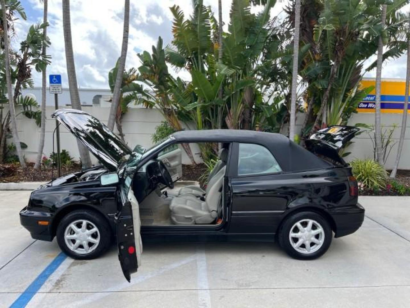 1998 Black /Black Volkswagen Cabrio GLS LOW MILES 69,287 (3VWBA81E3WM) with an 2.0L SOHC SMPI 4-Cyl Engine engine, Automatic transmission, located at 4701 North Dixie Hwy, Pompano Beach, FL, 33064, (954) 422-2889, 26.240938, -80.123474 - 1998 VOLKSWAGEN CABRIO GLS NEW $ 25,676 ROAD READY VIN: 3VWBA81E3WM801328 NO ACCIDENTS 31 MPG 2.0L I4 CONVERTIBLE HEATED LEATHER SEATS 2.0L I4 F POWER CONVERTIBLE TOP GASOLINE 11 SERVICE RECORDS FRONT WHEEL DRIVE POWER MIRRORS LOW MILES 69,287 ABS Brakes AM/FM Stereo Air Conditioning Alloy Wheels Au - Photo#8