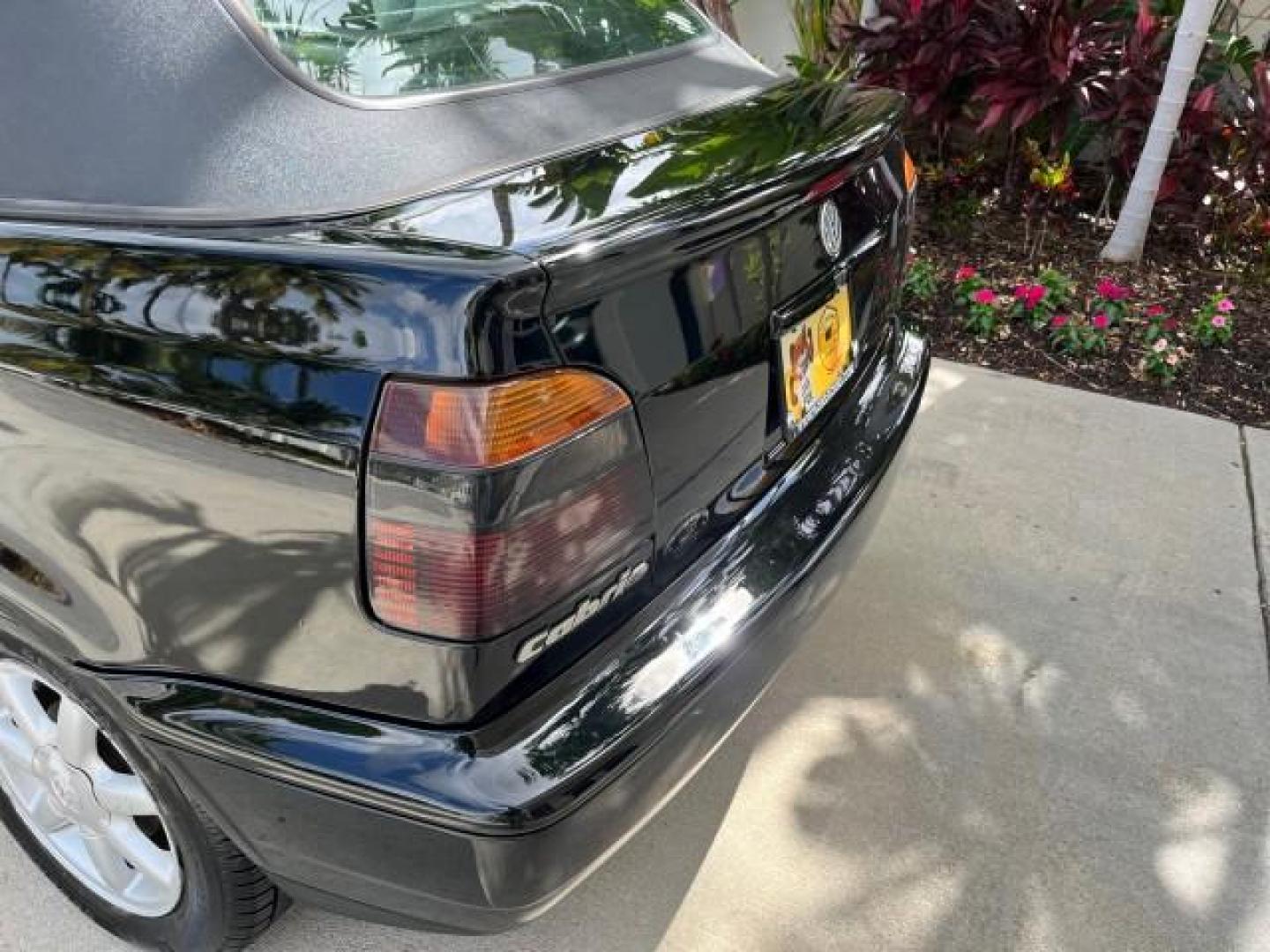 1998 Black /Black Volkswagen Cabrio GLS LOW MILES 69,287 (3VWBA81E3WM) with an 2.0L SOHC SMPI 4-Cyl Engine engine, Automatic transmission, located at 4701 North Dixie Hwy, Pompano Beach, FL, 33064, (954) 422-2889, 26.240938, -80.123474 - 1998 VOLKSWAGEN CABRIO GLS NEW $ 25,676 ROAD READY VIN: 3VWBA81E3WM801328 NO ACCIDENTS 31 MPG 2.0L I4 CONVERTIBLE HEATED LEATHER SEATS 2.0L I4 F POWER CONVERTIBLE TOP GASOLINE 11 SERVICE RECORDS FRONT WHEEL DRIVE POWER MIRRORS LOW MILES 69,287 ABS Brakes AM/FM Stereo Air Conditioning Alloy Wheels Au - Photo#97