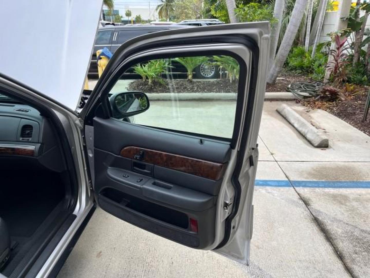 2004 Silver Birch Metallic /Light Flint Mercury Grand Marquis LS Ultimate LOW MILES 46,888 (2MEFM75W44X) with an 4.6L SOHC SEFI V8 Engine engine, Automatic transmission, located at 4701 North Dixie Hwy, Pompano Beach, FL, 33064, (954) 422-2889, 26.240938, -80.123474 - 2004 MERCURY GRAND MARQUIS LS PREMIUM NEW $ 33,310 ROAD READY VIN: 2MEFM75W44X662836 FLORIDA OWNER 4.6L V8 SEDAN 4 DR NO ACCIDENTS 3 SERV REC 4.6L V8 F DOHC POWER HEATED LEATHER SEATS GASOLINE POWER HEATED MIRRORS REAR WHEEL DRIVE LOW MILES 46,888 LS PREMIUM Alloy Wheels Approach Lights Auto-dimming - Photo#11