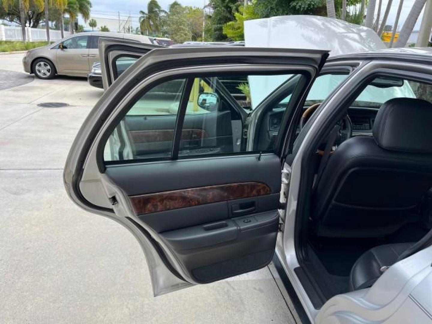 2004 Silver Birch Metallic /Light Flint Mercury Grand Marquis LS Ultimate LOW MILES 46,888 (2MEFM75W44X) with an 4.6L SOHC SEFI V8 Engine engine, Automatic transmission, located at 4701 North Dixie Hwy, Pompano Beach, FL, 33064, (954) 422-2889, 26.240938, -80.123474 - 2004 MERCURY GRAND MARQUIS LS PREMIUM NEW $ 33,310 ROAD READY VIN: 2MEFM75W44X662836 FLORIDA OWNER 4.6L V8 SEDAN 4 DR NO ACCIDENTS 3 SERV REC 4.6L V8 F DOHC POWER HEATED LEATHER SEATS GASOLINE POWER HEATED MIRRORS REAR WHEEL DRIVE LOW MILES 46,888 LS PREMIUM Alloy Wheels Approach Lights Auto-dimming - Photo#13