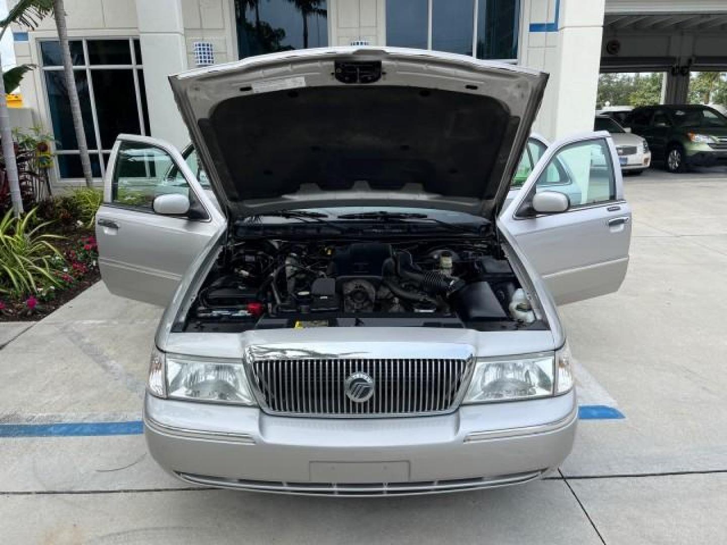 2004 Silver Birch Metallic /Light Flint Mercury Grand Marquis LS Ultimate LOW MILES 46,888 (2MEFM75W44X) with an 4.6L SOHC SEFI V8 Engine engine, Automatic transmission, located at 4701 North Dixie Hwy, Pompano Beach, FL, 33064, (954) 422-2889, 26.240938, -80.123474 - 2004 MERCURY GRAND MARQUIS LS PREMIUM NEW $ 33,310 ROAD READY VIN: 2MEFM75W44X662836 FLORIDA OWNER 4.6L V8 SEDAN 4 DR NO ACCIDENTS 3 SERV REC 4.6L V8 F DOHC POWER HEATED LEATHER SEATS GASOLINE POWER HEATED MIRRORS REAR WHEEL DRIVE LOW MILES 46,888 LS PREMIUM Alloy Wheels Approach Lights Auto-dimming - Photo#16