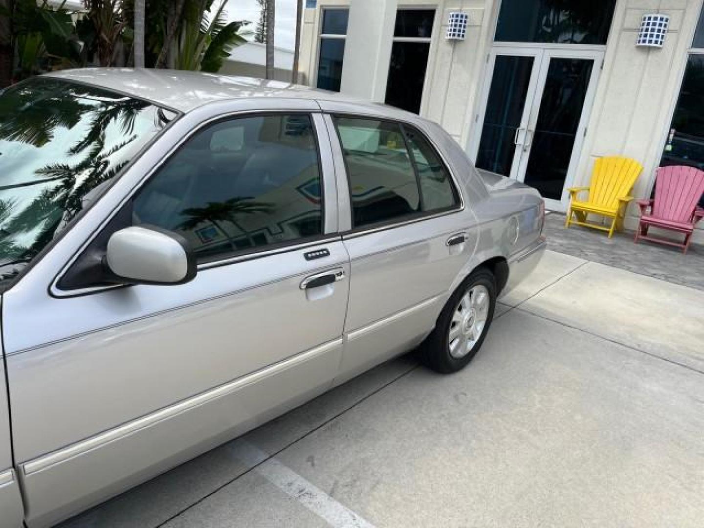 2004 Silver Birch Metallic /Light Flint Mercury Grand Marquis LS Ultimate LOW MILES 46,888 (2MEFM75W44X) with an 4.6L SOHC SEFI V8 Engine engine, Automatic transmission, located at 4701 North Dixie Hwy, Pompano Beach, FL, 33064, (954) 422-2889, 26.240938, -80.123474 - 2004 MERCURY GRAND MARQUIS LS PREMIUM NEW $ 33,310 ROAD READY VIN: 2MEFM75W44X662836 FLORIDA OWNER 4.6L V8 SEDAN 4 DR NO ACCIDENTS 3 SERV REC 4.6L V8 F DOHC POWER HEATED LEATHER SEATS GASOLINE POWER HEATED MIRRORS REAR WHEEL DRIVE LOW MILES 46,888 LS PREMIUM Alloy Wheels Approach Lights Auto-dimming - Photo#73