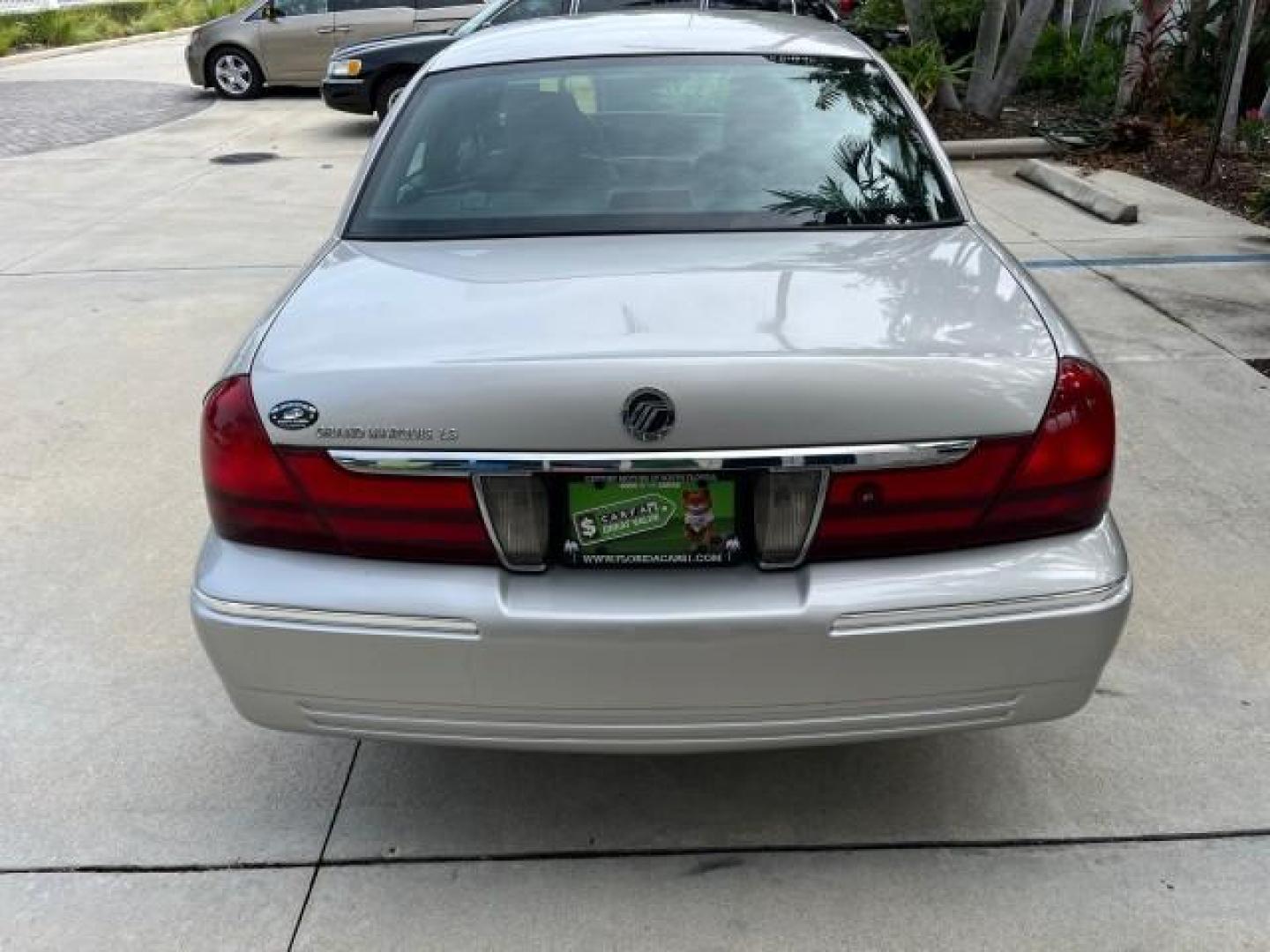 2004 Silver Birch Metallic /Light Flint Mercury Grand Marquis LS Ultimate LOW MILES 46,888 (2MEFM75W44X) with an 4.6L SOHC SEFI V8 Engine engine, Automatic transmission, located at 4701 North Dixie Hwy, Pompano Beach, FL, 33064, (954) 422-2889, 26.240938, -80.123474 - 2004 MERCURY GRAND MARQUIS LS PREMIUM NEW $ 33,310 ROAD READY VIN: 2MEFM75W44X662836 FLORIDA OWNER 4.6L V8 SEDAN 4 DR NO ACCIDENTS 3 SERV REC 4.6L V8 F DOHC POWER HEATED LEATHER SEATS GASOLINE POWER HEATED MIRRORS REAR WHEEL DRIVE LOW MILES 46,888 LS PREMIUM Alloy Wheels Approach Lights Auto-dimming - Photo#81