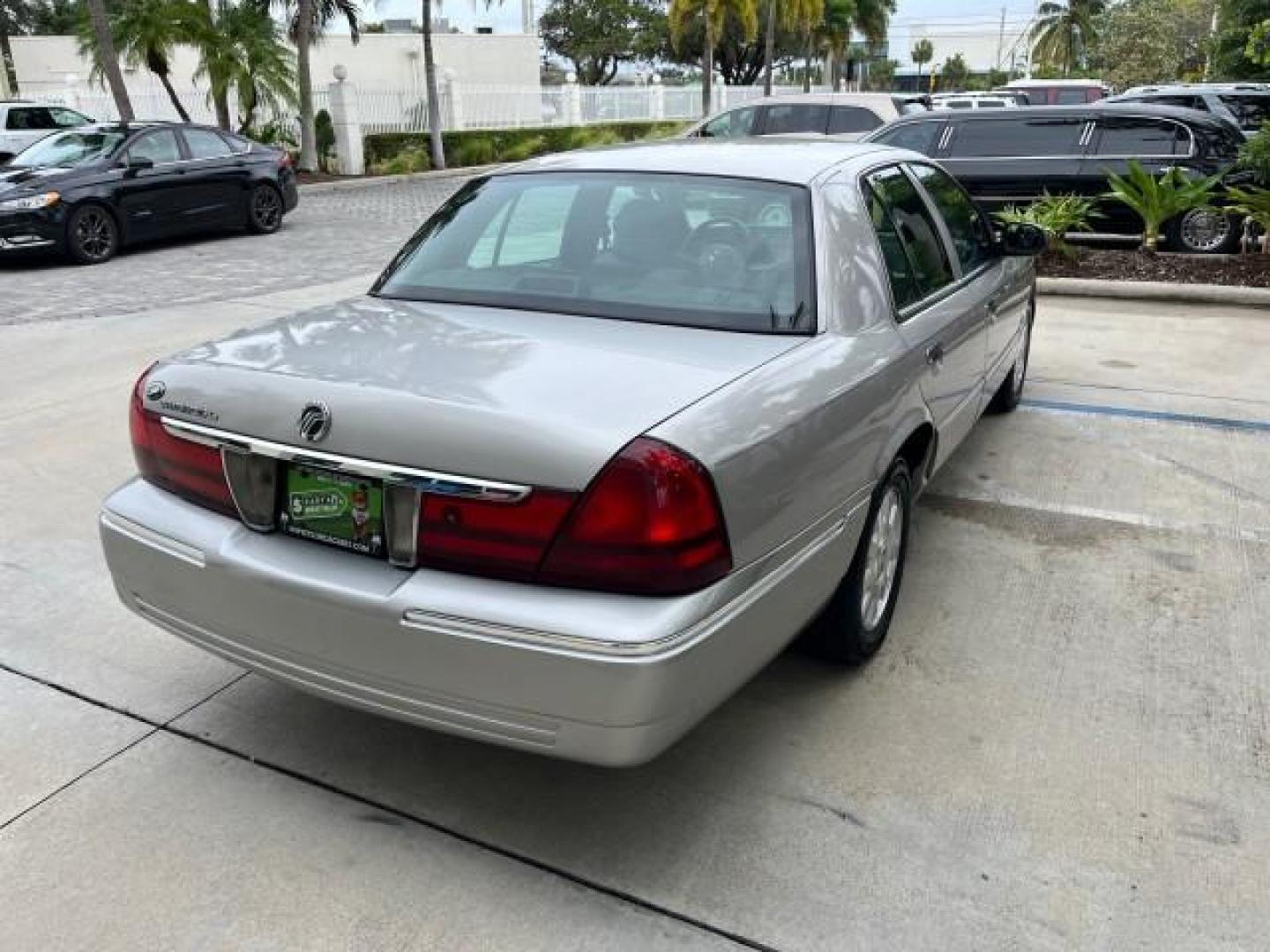 2004 Silver Birch Metallic /Light Flint Mercury Grand Marquis LS Ultimate LOW MILES 46,888 (2MEFM75W44X) with an 4.6L SOHC SEFI V8 Engine engine, Automatic transmission, located at 4701 North Dixie Hwy, Pompano Beach, FL, 33064, (954) 422-2889, 26.240938, -80.123474 - 2004 MERCURY GRAND MARQUIS LS PREMIUM NEW $ 33,310 ROAD READY VIN: 2MEFM75W44X662836 FLORIDA OWNER 4.6L V8 SEDAN 4 DR NO ACCIDENTS 3 SERV REC 4.6L V8 F DOHC POWER HEATED LEATHER SEATS GASOLINE POWER HEATED MIRRORS REAR WHEEL DRIVE LOW MILES 46,888 LS PREMIUM Alloy Wheels Approach Lights Auto-dimming - Photo#82