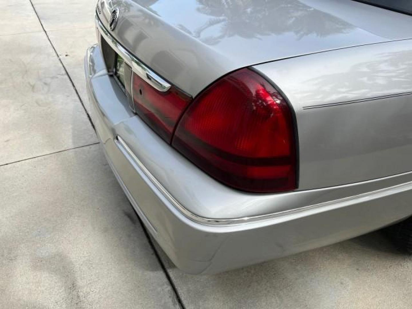 2004 Silver Birch Metallic /Light Flint Mercury Grand Marquis LS Ultimate LOW MILES 46,888 (2MEFM75W44X) with an 4.6L SOHC SEFI V8 Engine engine, Automatic transmission, located at 4701 North Dixie Hwy, Pompano Beach, FL, 33064, (954) 422-2889, 26.240938, -80.123474 - 2004 MERCURY GRAND MARQUIS LS PREMIUM NEW $ 33,310 ROAD READY VIN: 2MEFM75W44X662836 FLORIDA OWNER 4.6L V8 SEDAN 4 DR NO ACCIDENTS 3 SERV REC 4.6L V8 F DOHC POWER HEATED LEATHER SEATS GASOLINE POWER HEATED MIRRORS REAR WHEEL DRIVE LOW MILES 46,888 LS PREMIUM Alloy Wheels Approach Lights Auto-dimming - Photo#89