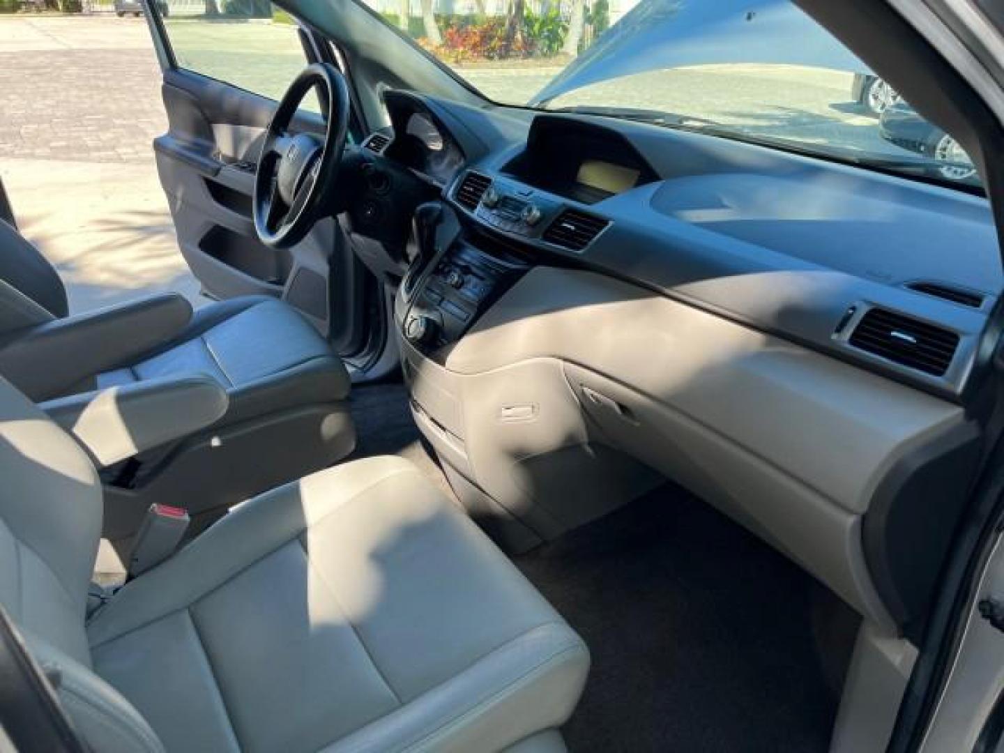 2011 Alabaster Silver Metallic /Gray Honda Odyssey LEATHER LX LOW MILES 70,192 (5FNRL5H21BB) with an 3.5L SOHC MPFI 24-Valve i-VTEC V6 Engine engine, Automatic transmission, located at 4701 North Dixie Hwy, Pompano Beach, FL, 33064, (954) 422-2889, 26.240938, -80.123474 - 2011 HONDA ODYSSEY LX LEATHER ROAD READY 3.5L V6 VIN: 5FNRL5H21BB053893 NO ACCIDENTS NO RECALLS VAN $28,800 NEW FLORIDA OWNER 27 MPG 3.5L V6 F SOHC 24V 3 ROW POWER LEATHER SEATS GASOLINE 26 SERVICE RECORDS FRONT WHEEL DRIVE NEW LIKE TIRES DUAL ZONE AC LOW MILES 70,192 Active Head Restraints Anti-The - Photo#25